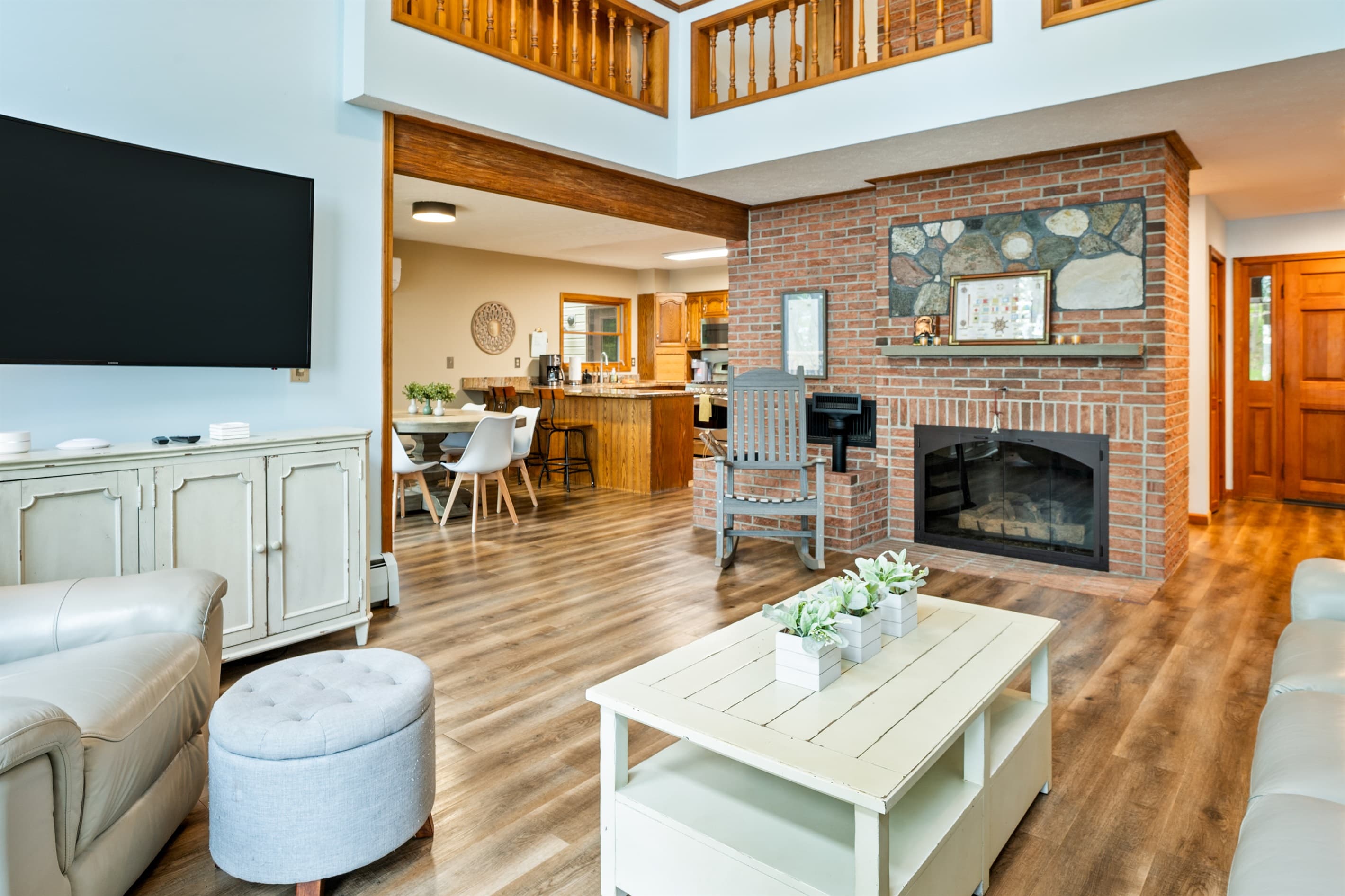 Open living area with stone fireplace