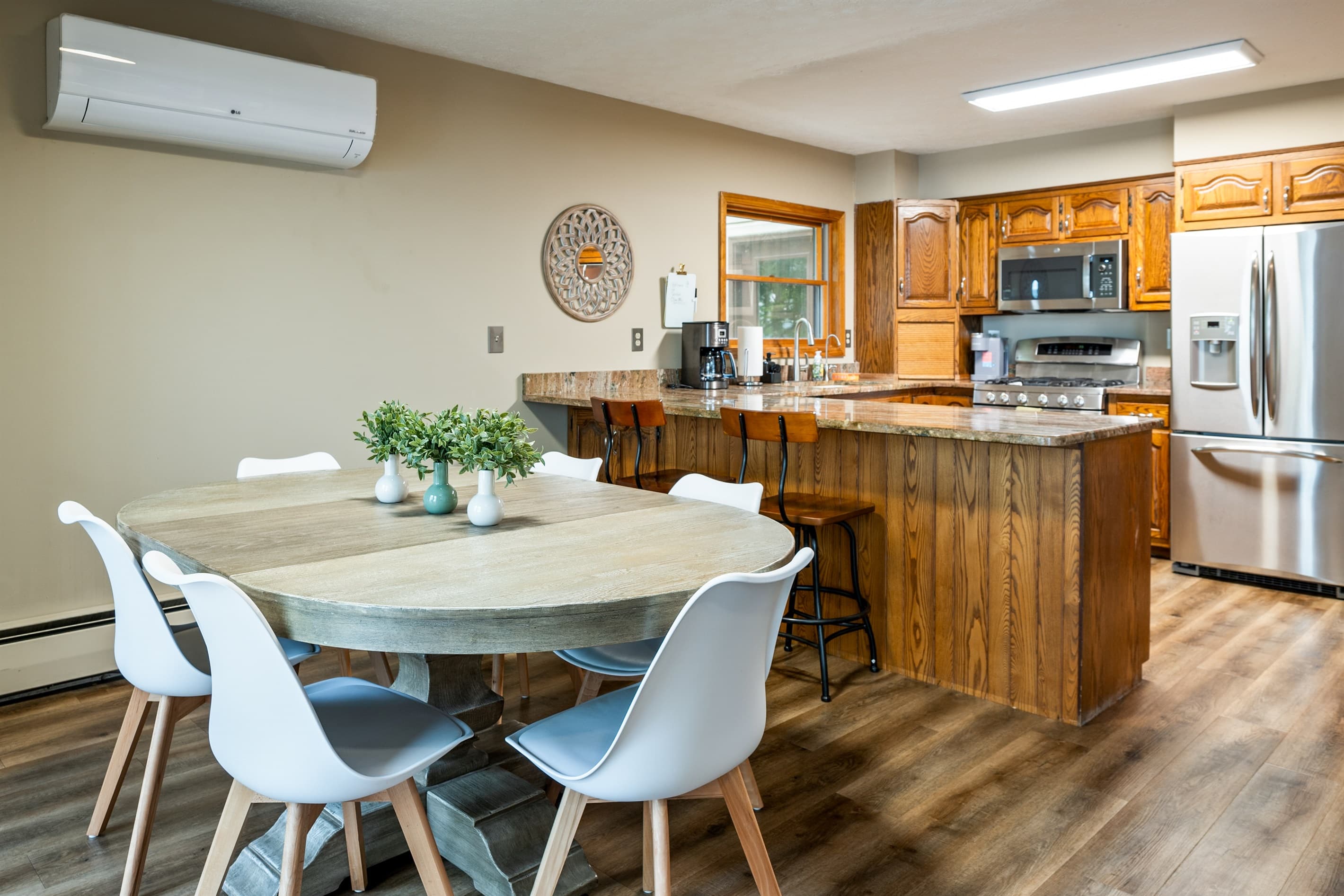 Round dining table beside the kitchen