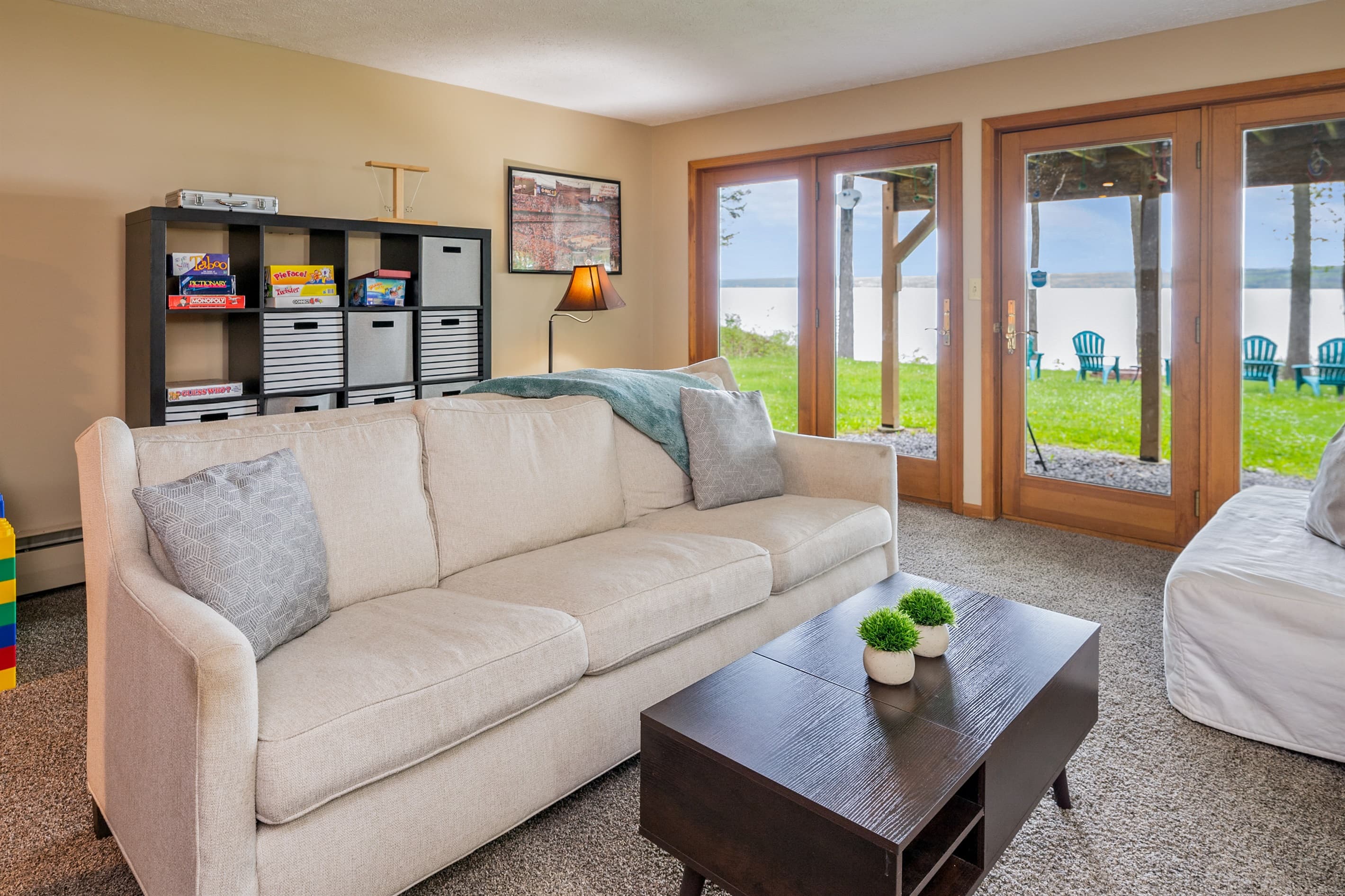 Living room with games and deck access