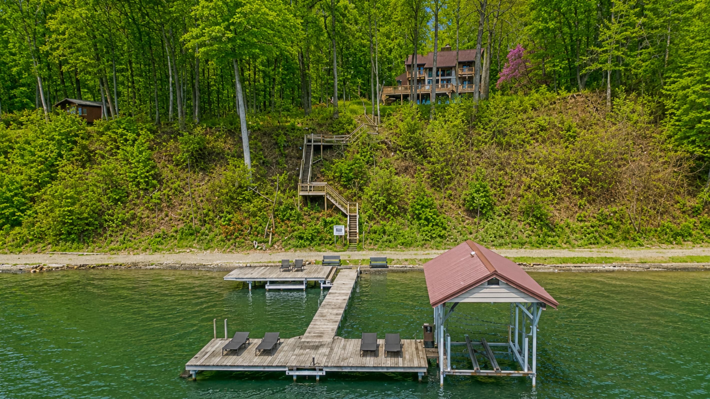 Aerial view of shoreline steps and dock