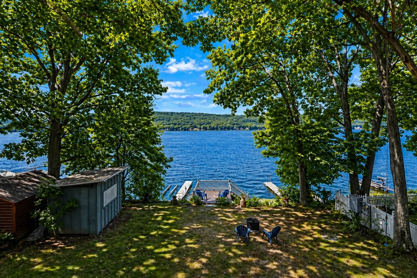Lake view through mature trees