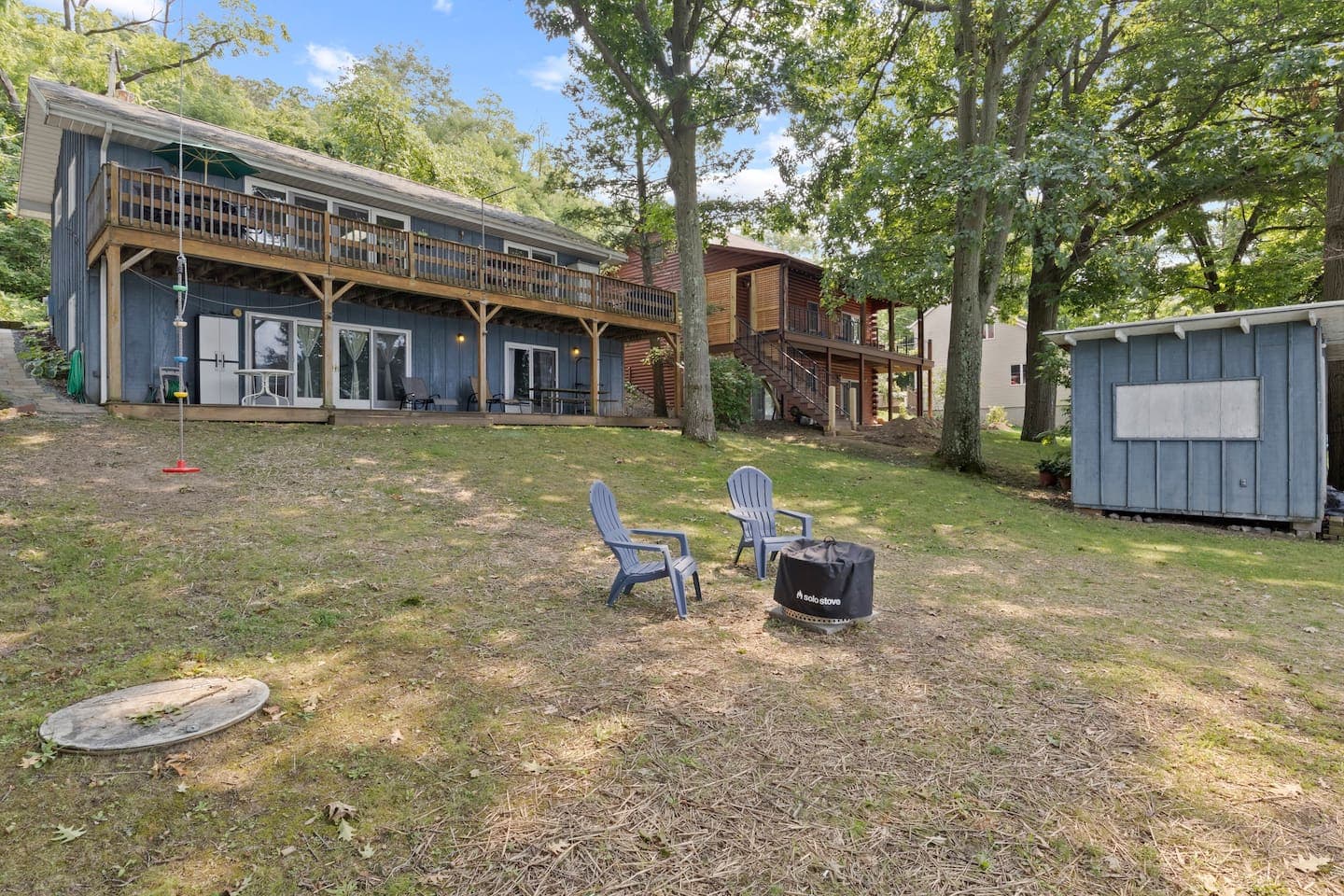 Two-story cottage with full-width deck