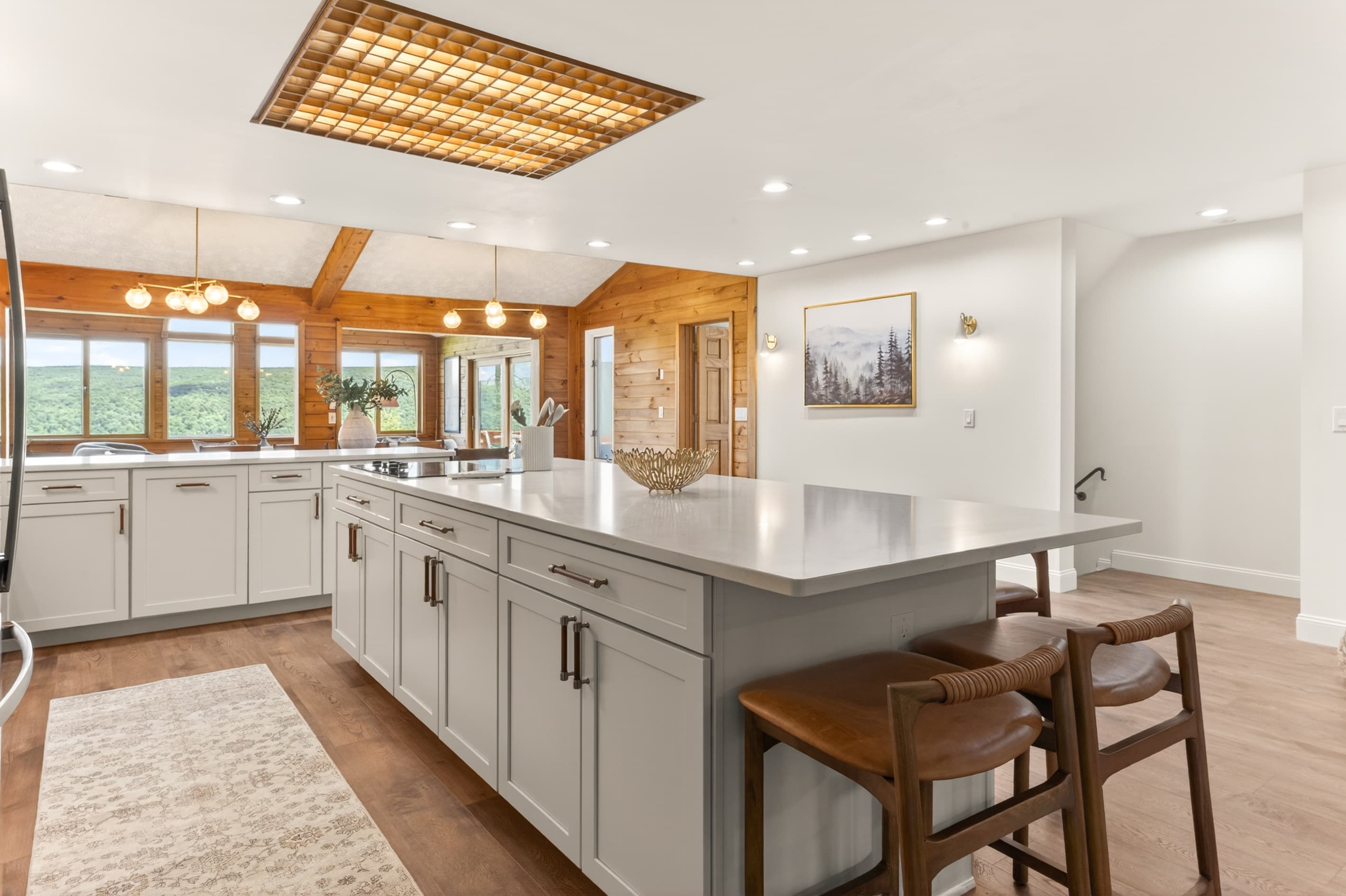 White kitchen with breakfast bar seating
