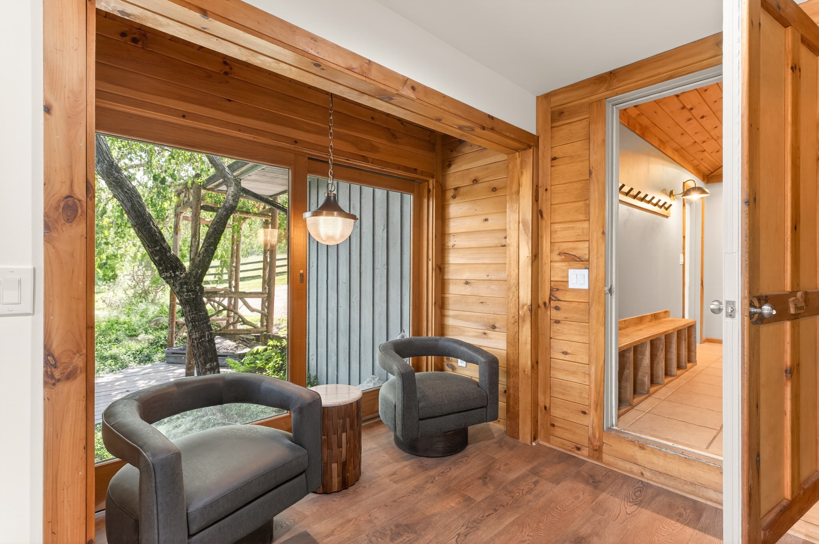 Windowed sitting area with two armchairs