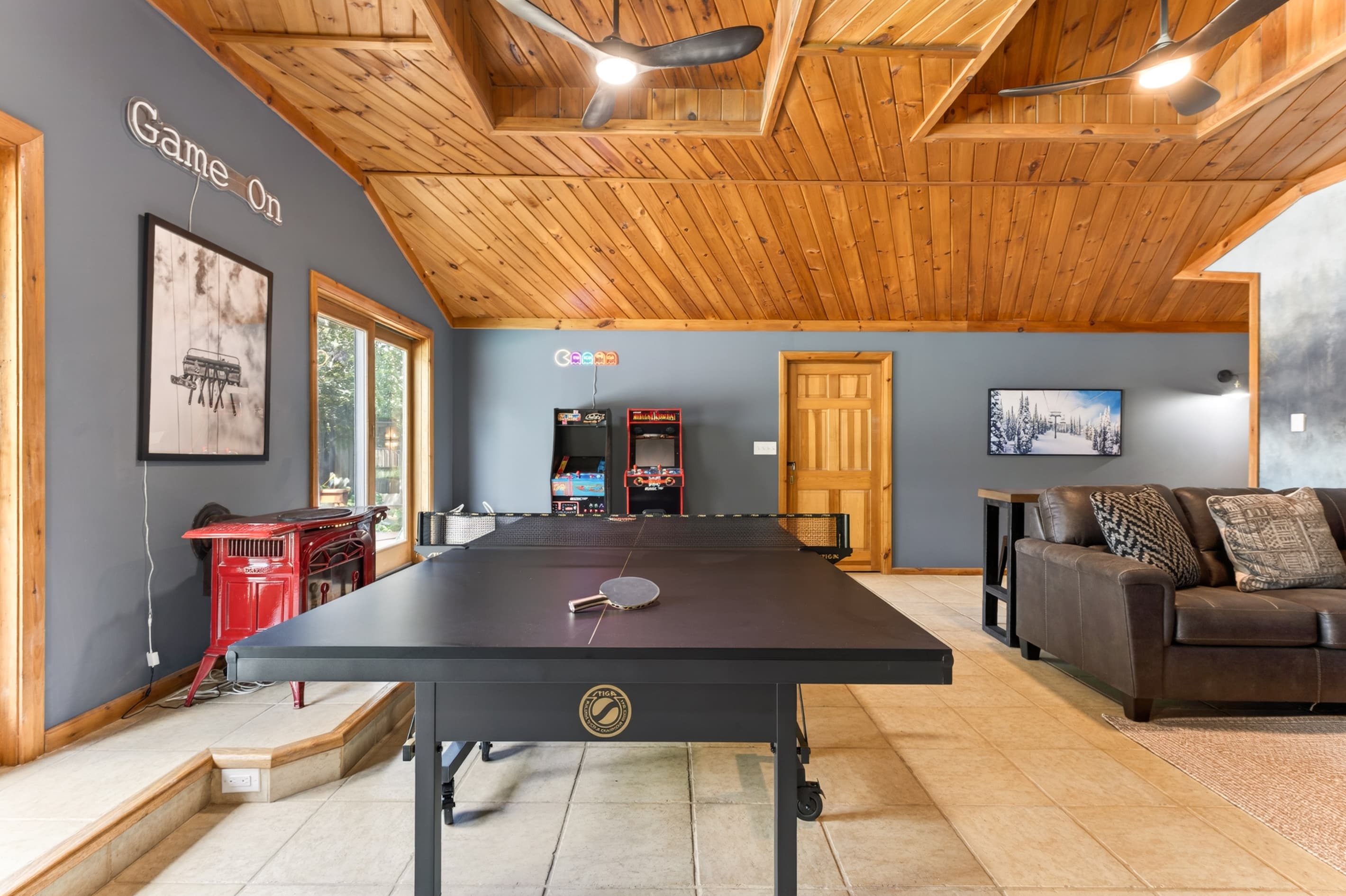 Pool table in the wood-paneled game room