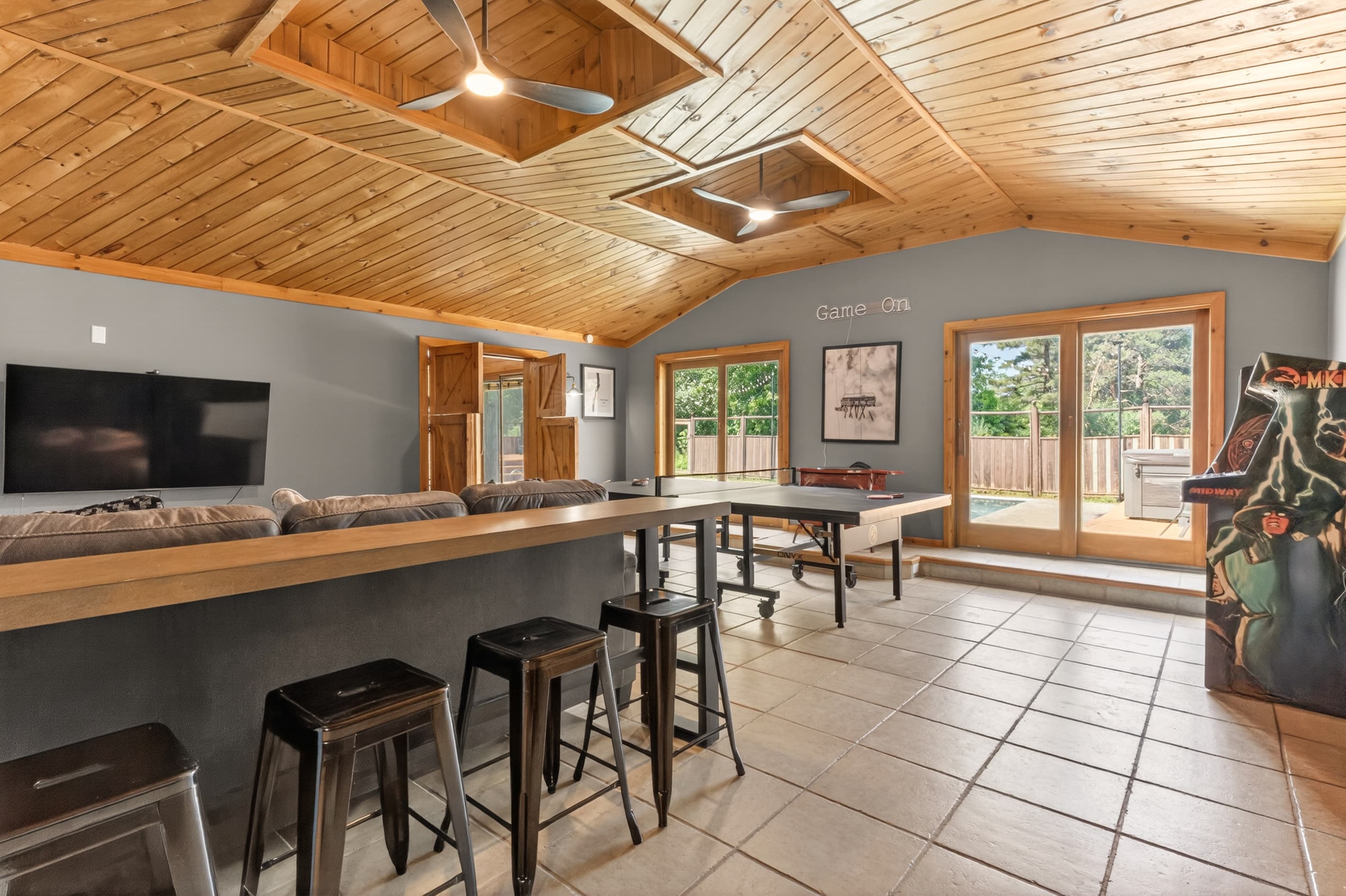 Bar seating overlooking the recreation room