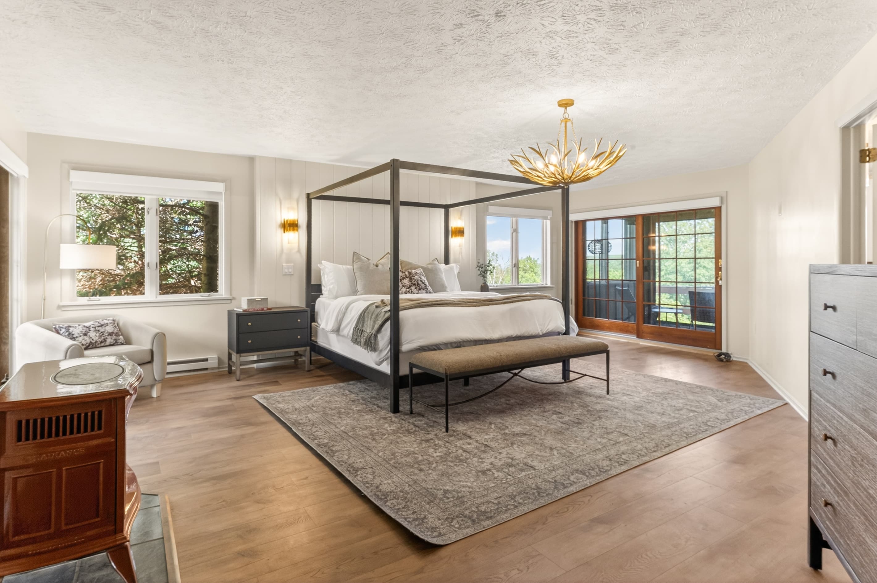Bedroom with canopy bed and dresser