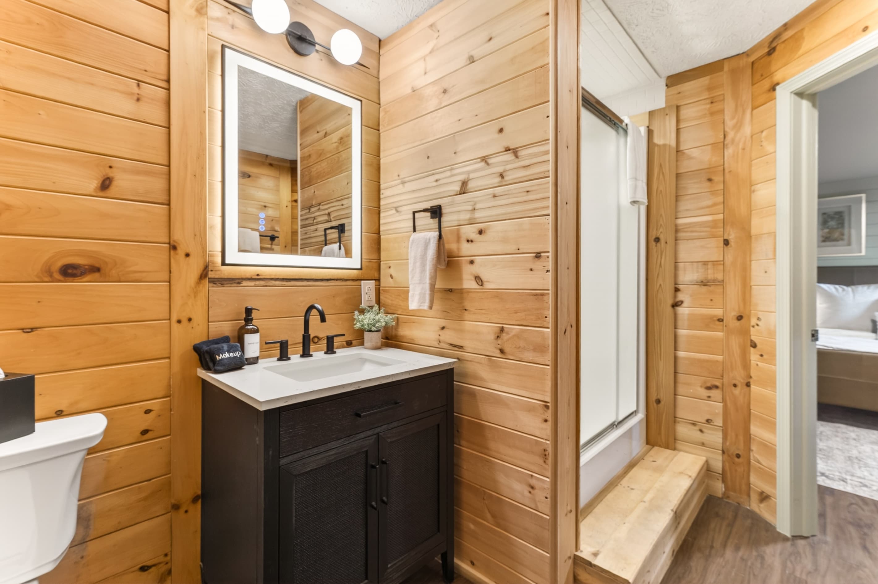 Bathroom vanity with black cabinet