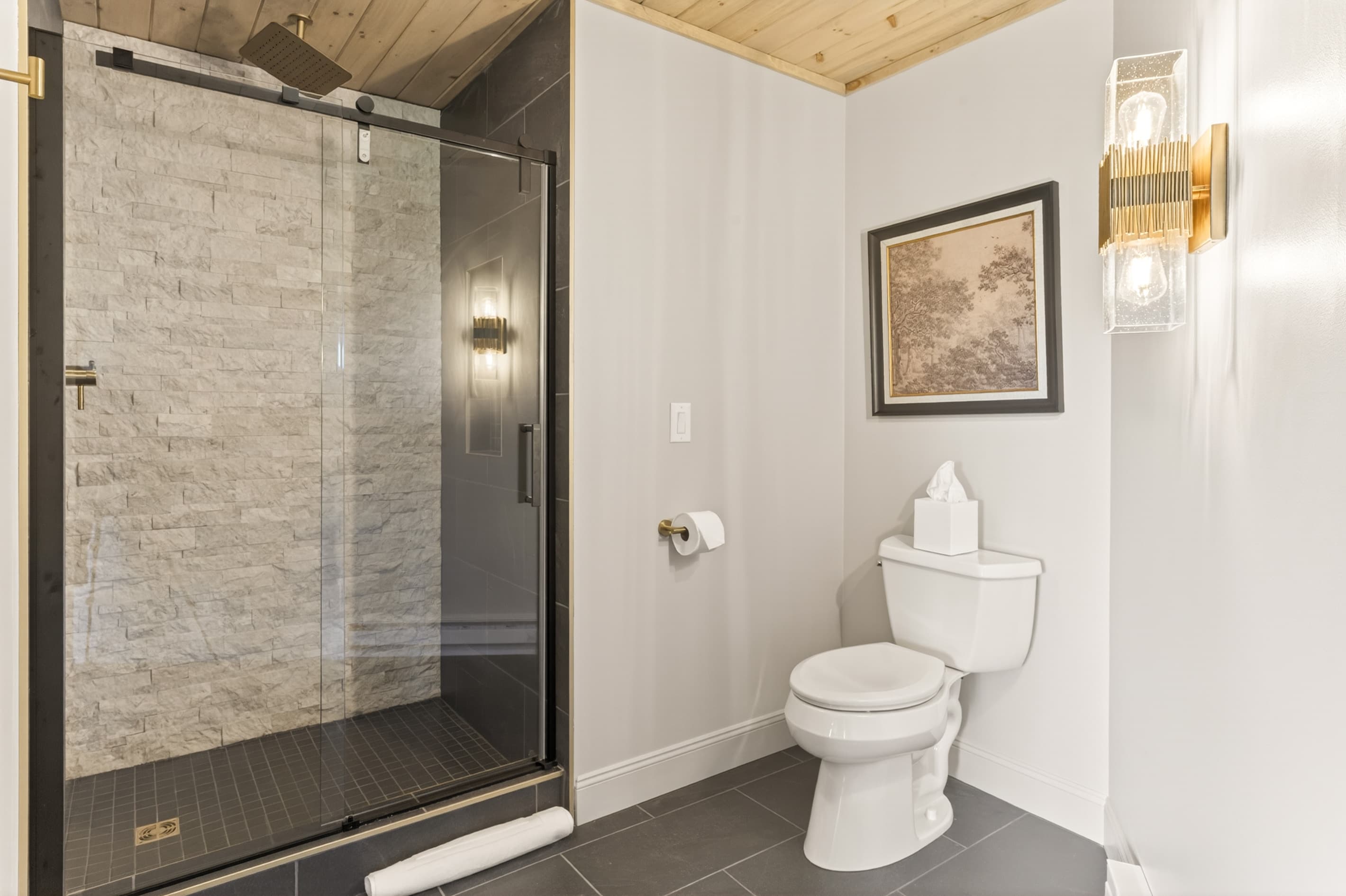 Bathroom with glass-enclosed walk-in shower