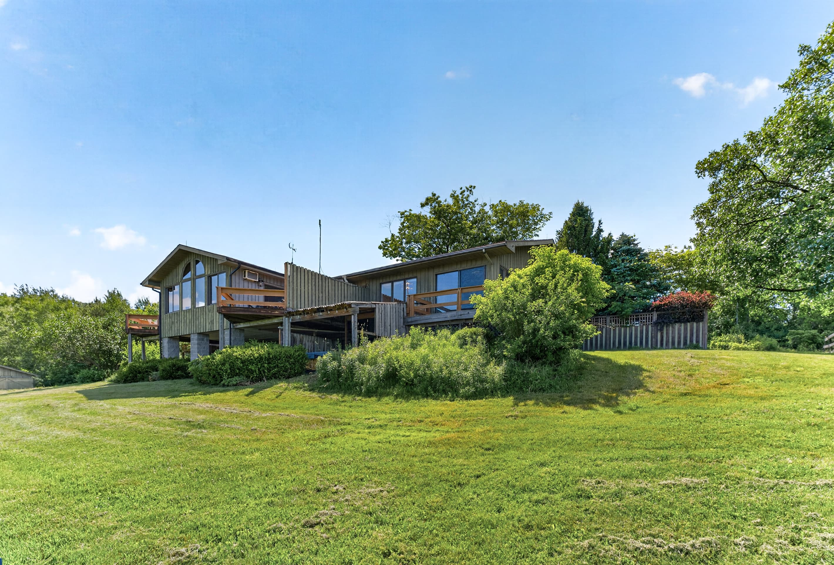 House viewed across the open lawn