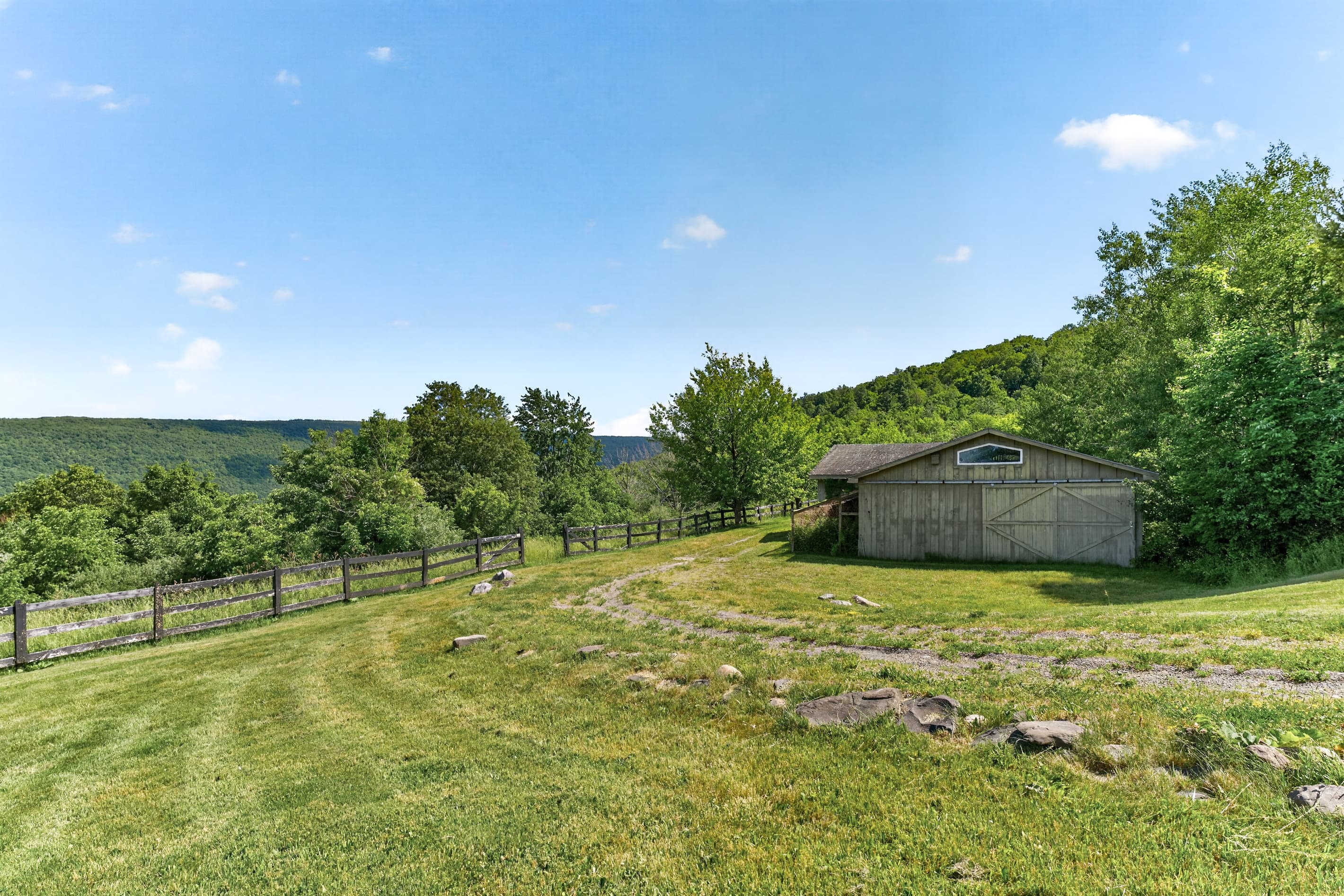 Open field with a small shed