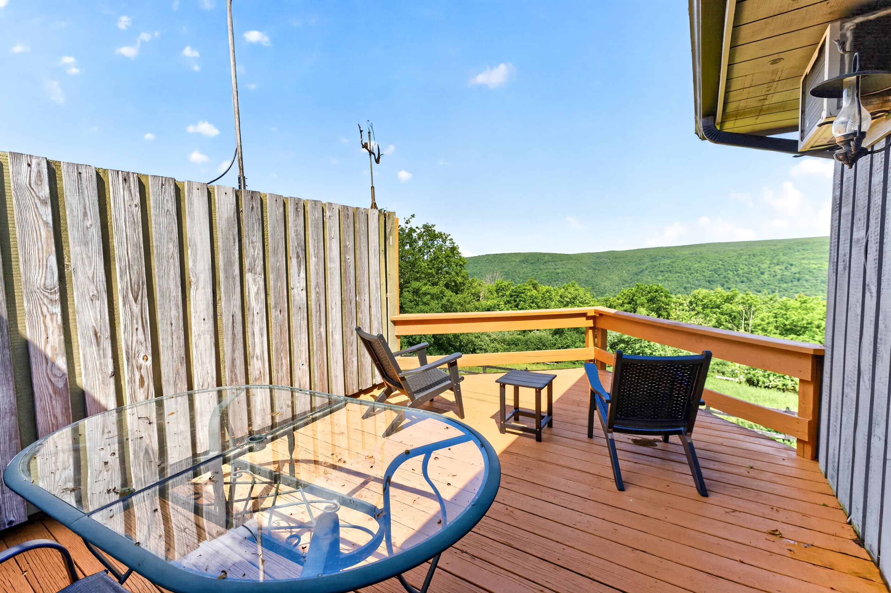 Deck seating overlooking the lawn