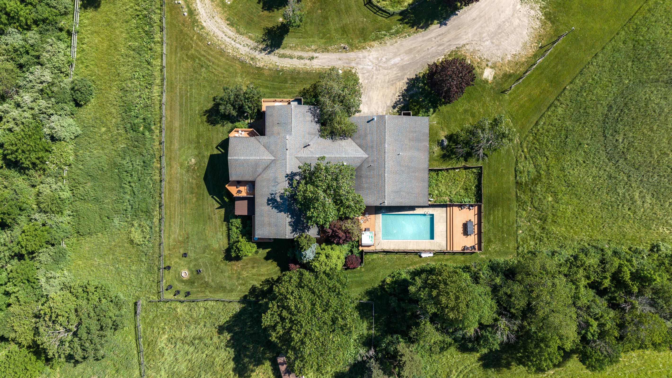 Overhead view of the home and pool