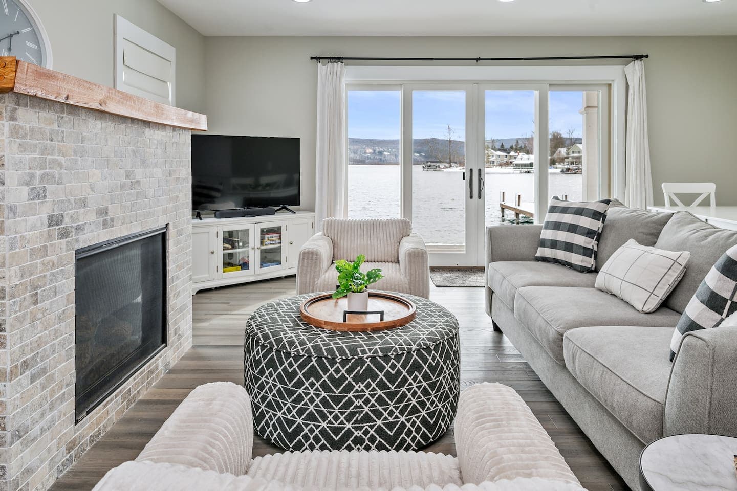 Living room with fireplace and television