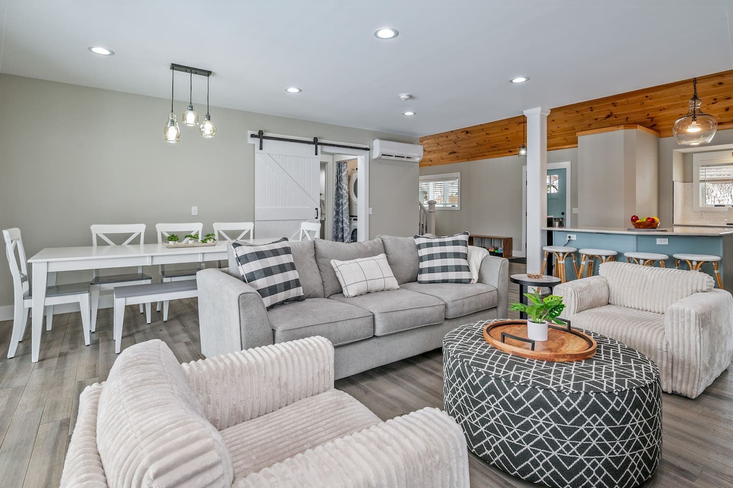 Sectional seating beside the open kitchen