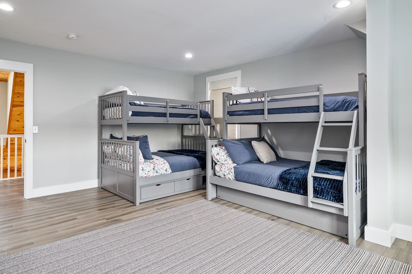 Bunk room with two wooden bunk beds