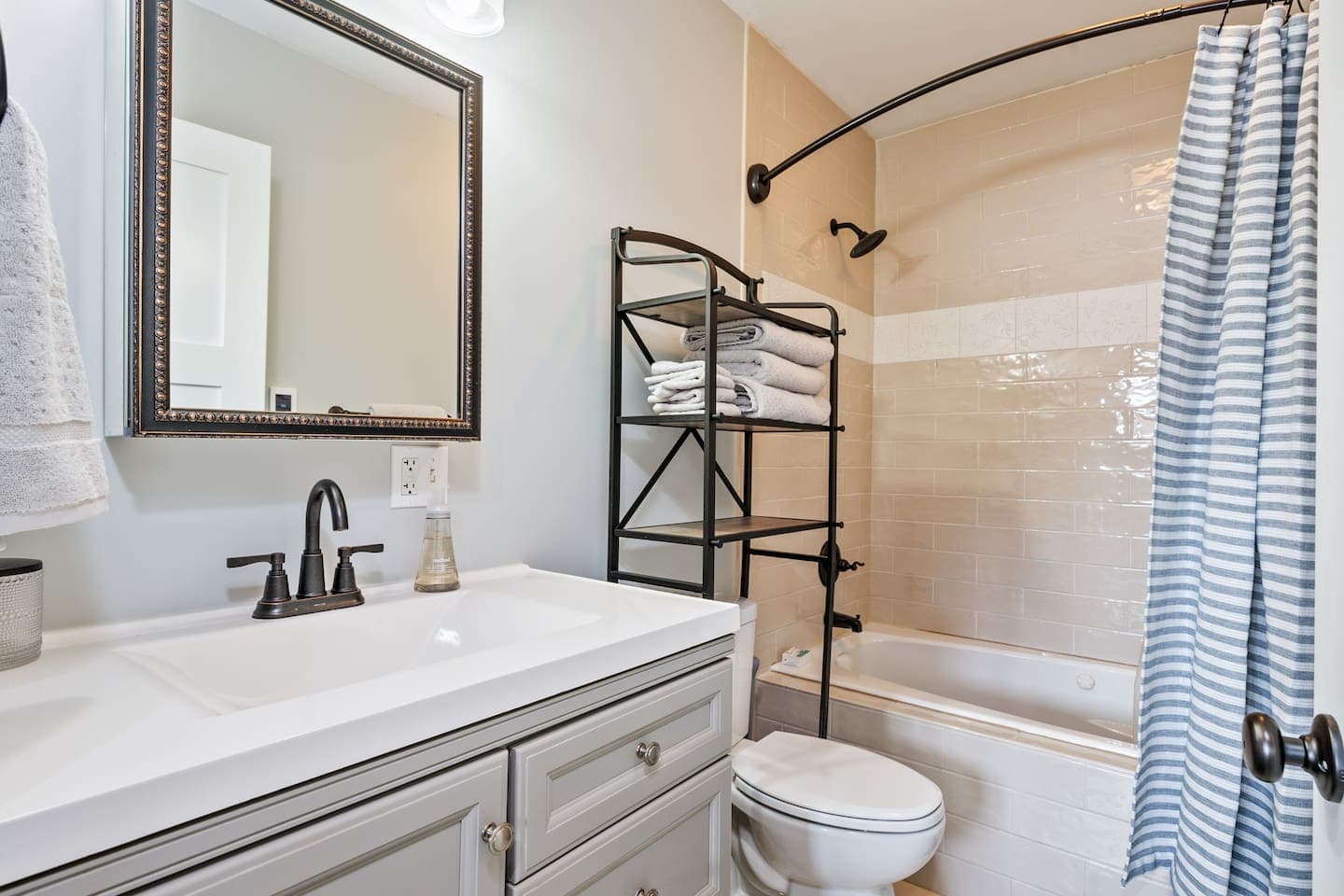 Bathroom with vanity and shower curtain