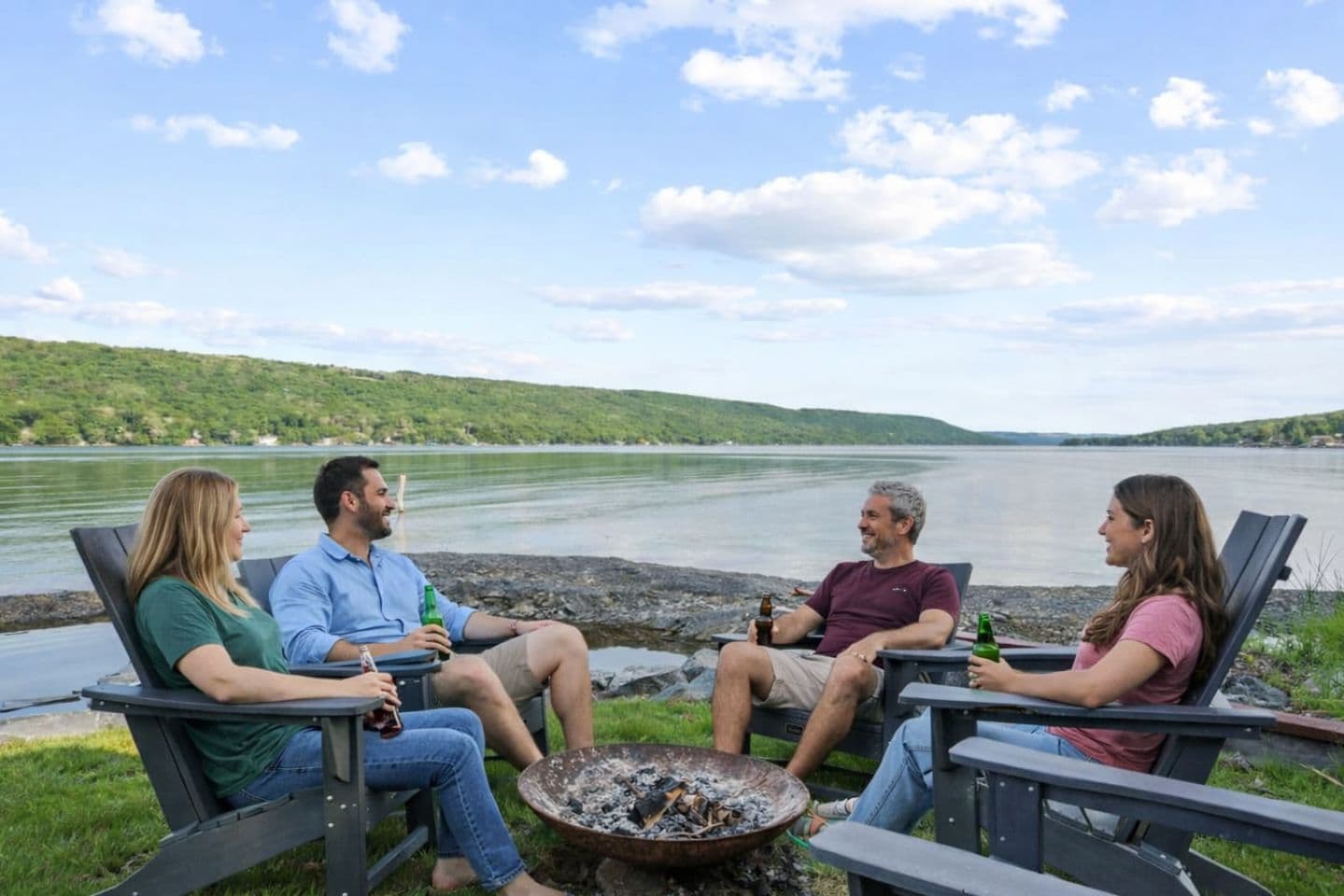 Lakeside fire pit with Adirondack chairs
