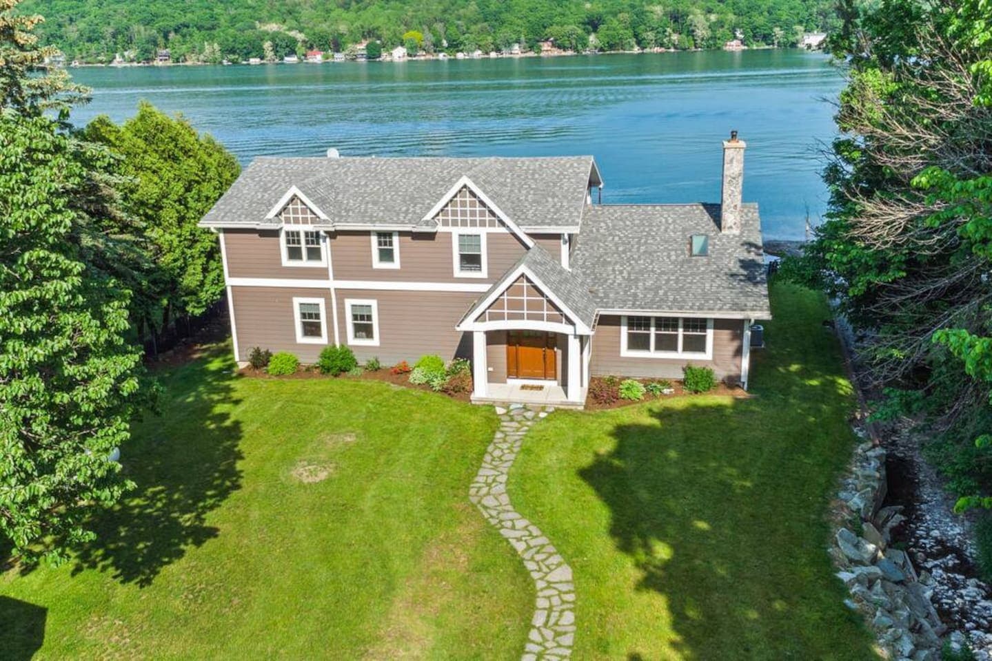Front exterior with lake in background