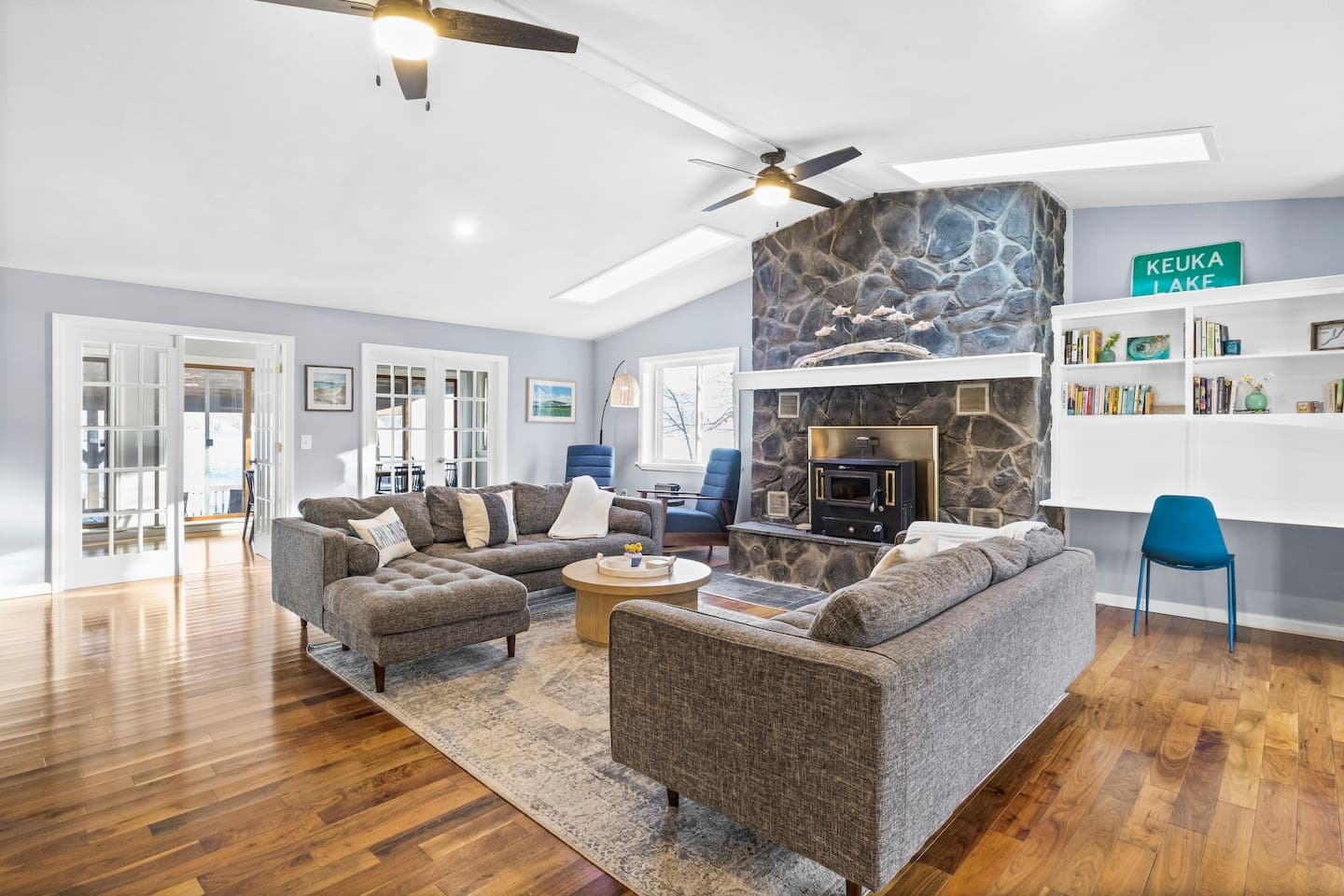 Open living area with sectional grey couch 