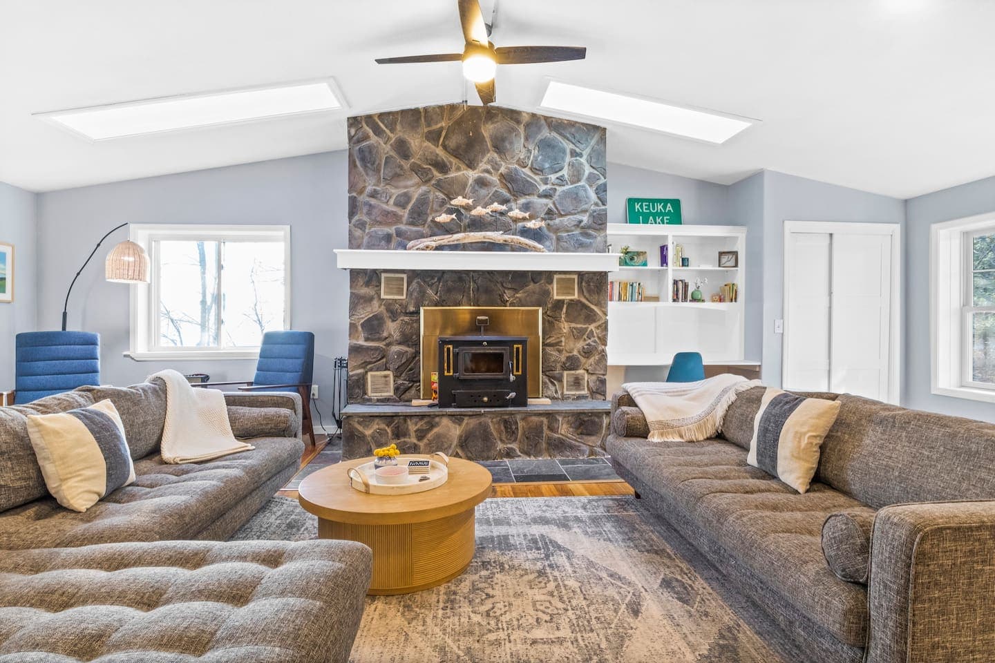Living room with stone fireplace