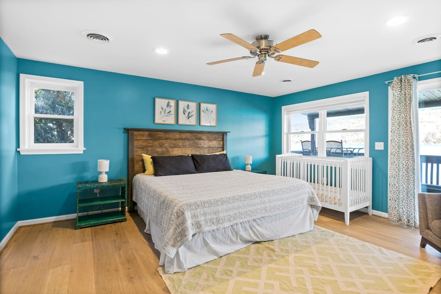 Blue bedroom with wooden bed frame