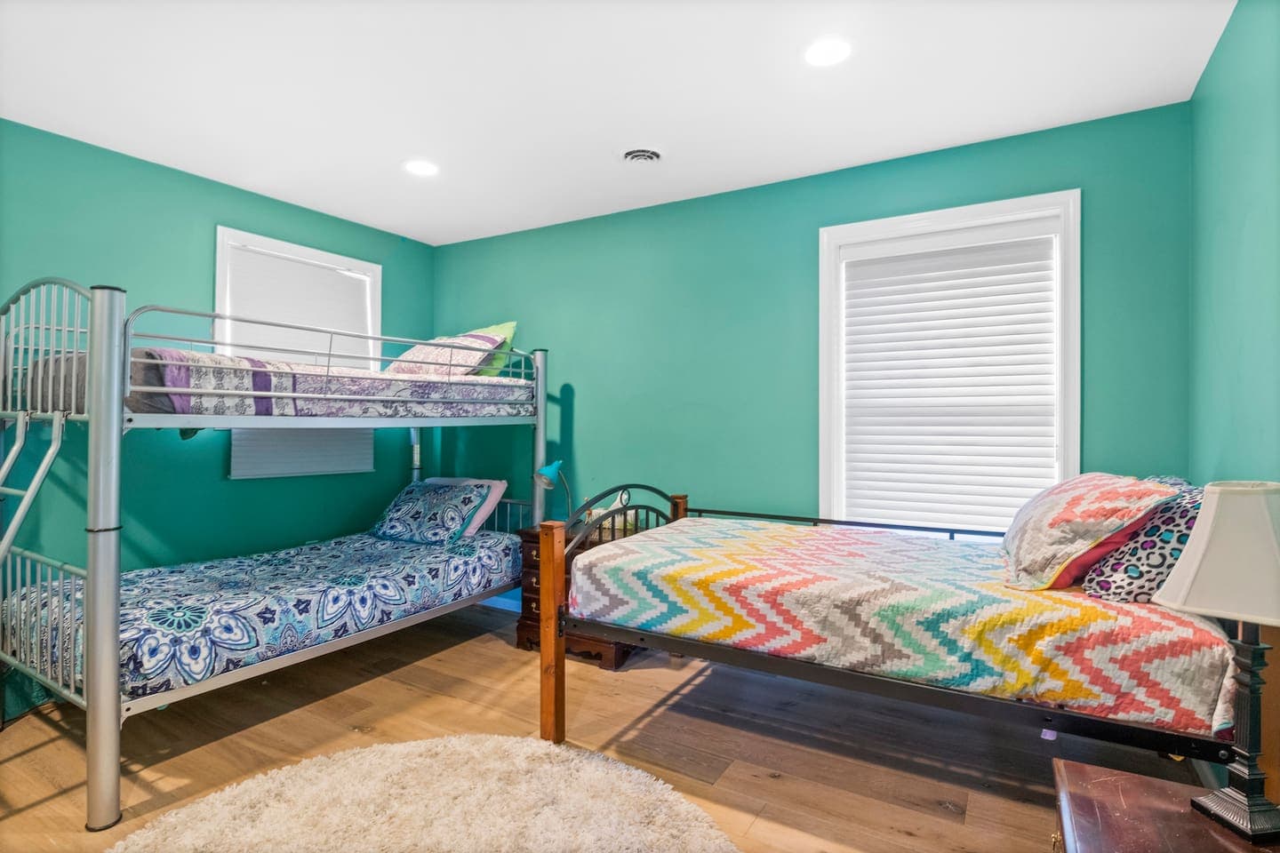 Bedroom with bunk beds and window