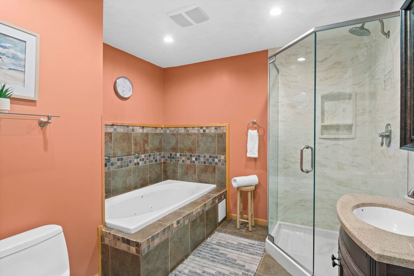 Bathroom with tiled tub surround