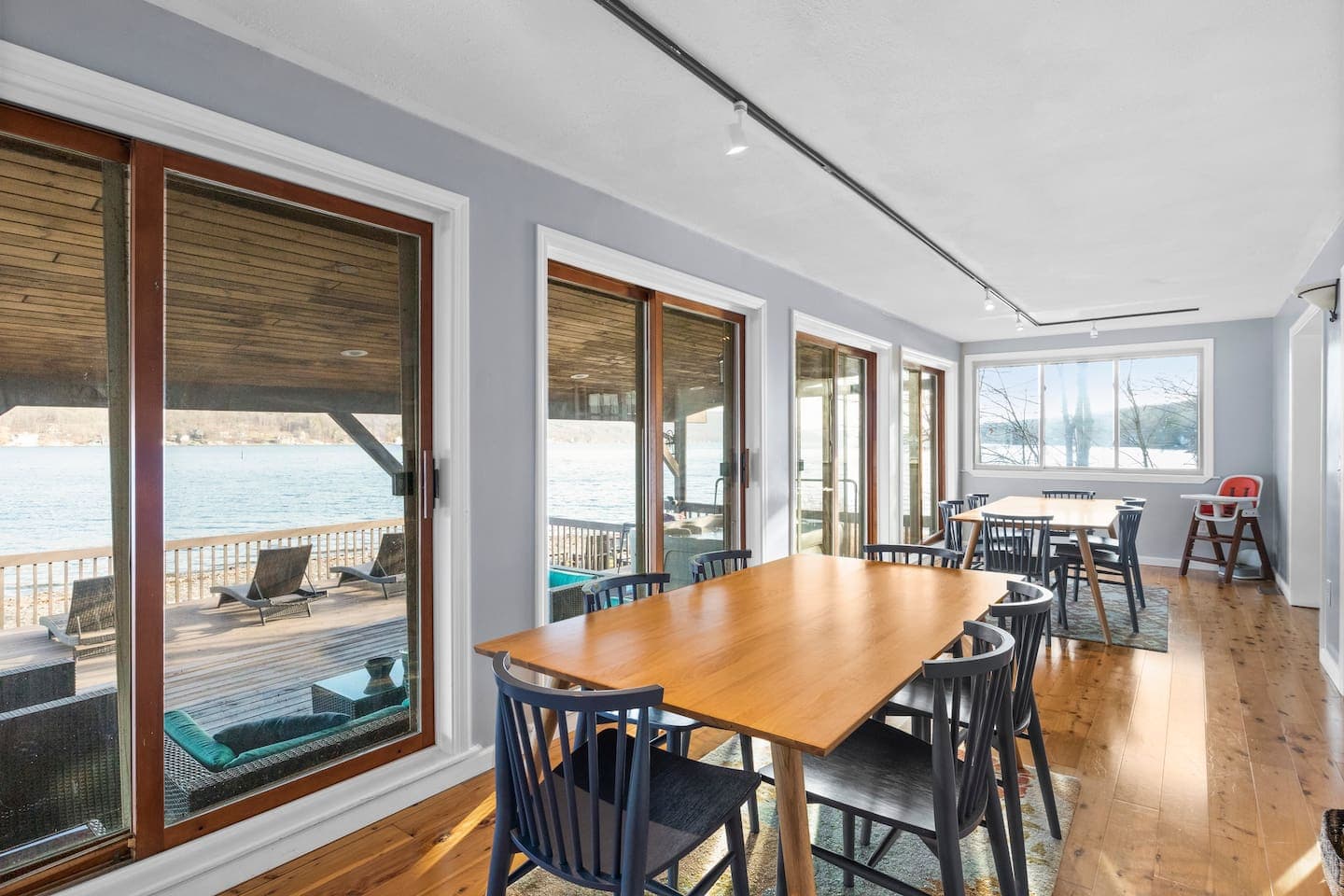Enclosed dining area with lake views