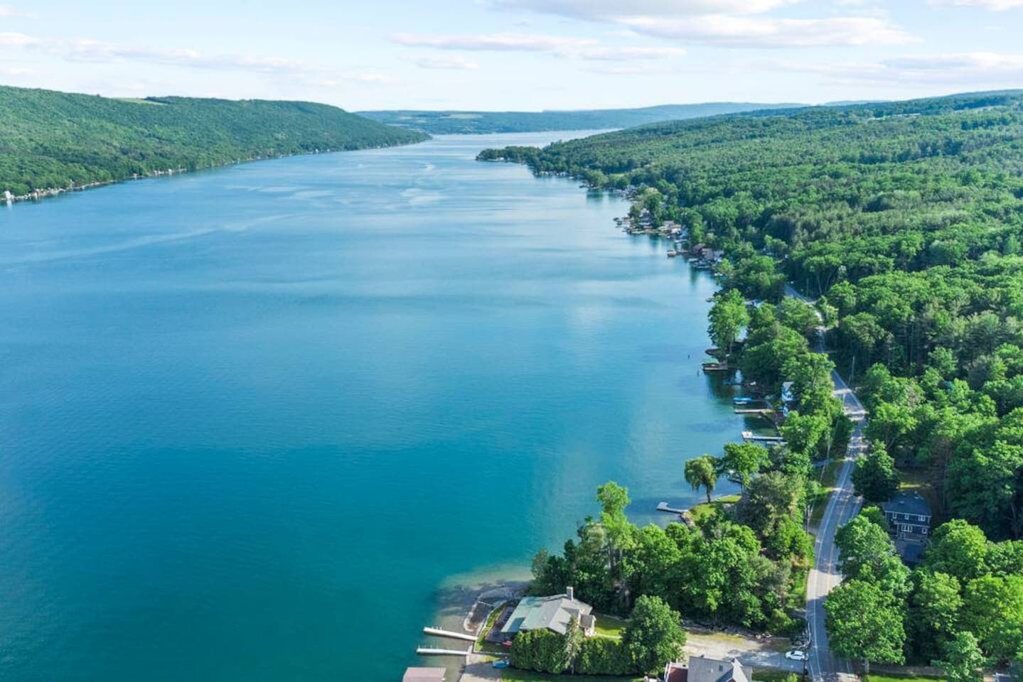 Keuka Lake surrounded by wooded shoreline