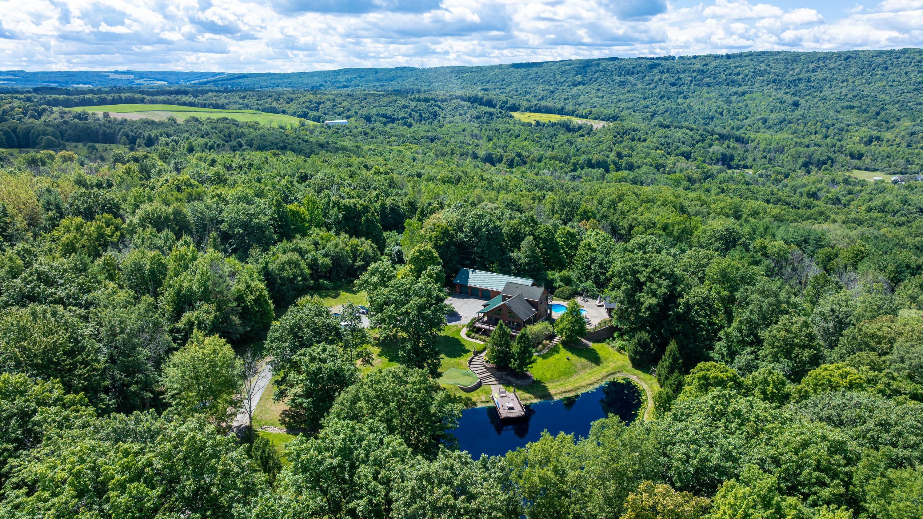 Aerial view across the wooded valley