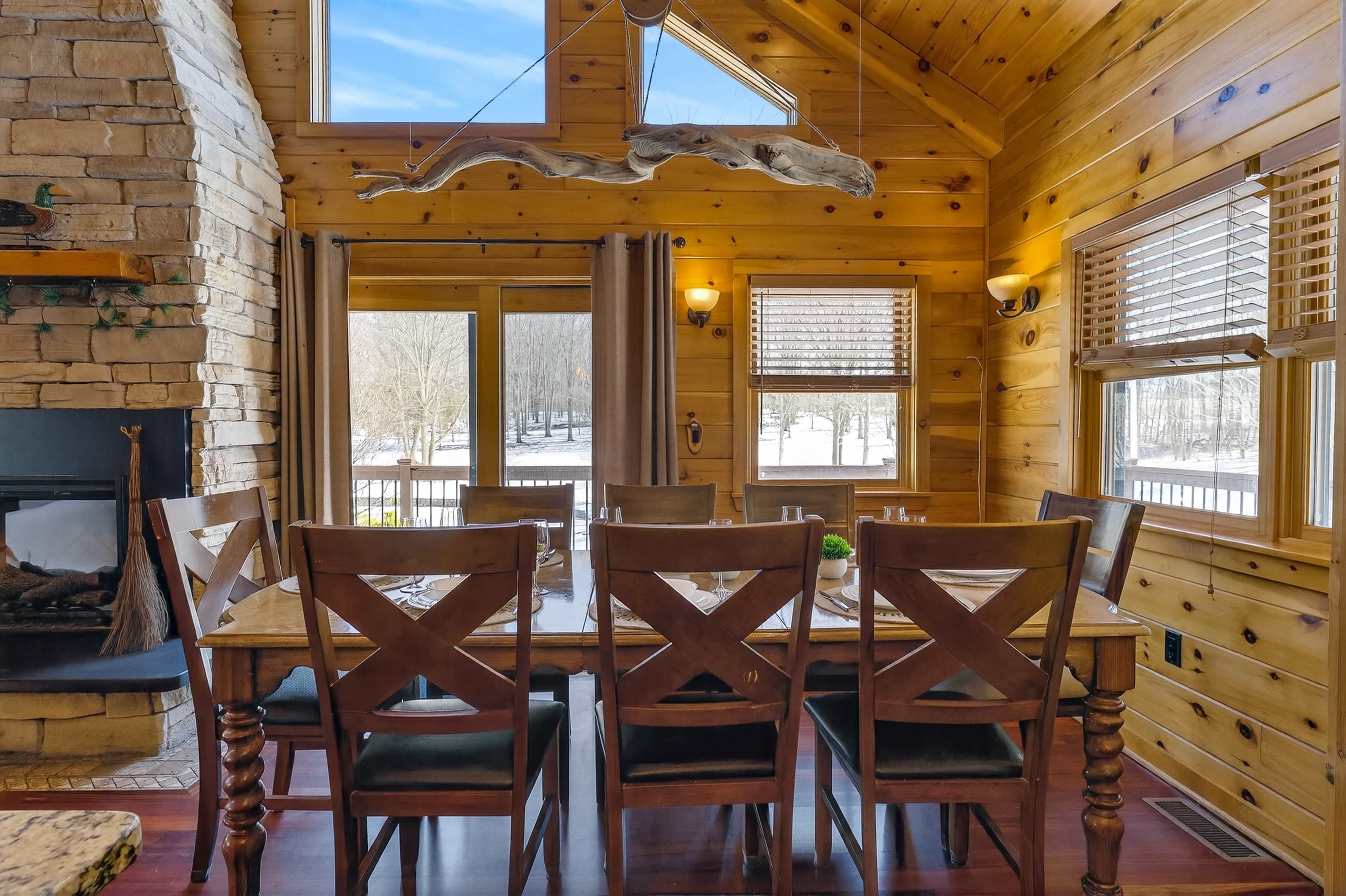 Dining area with wooden table and chairs