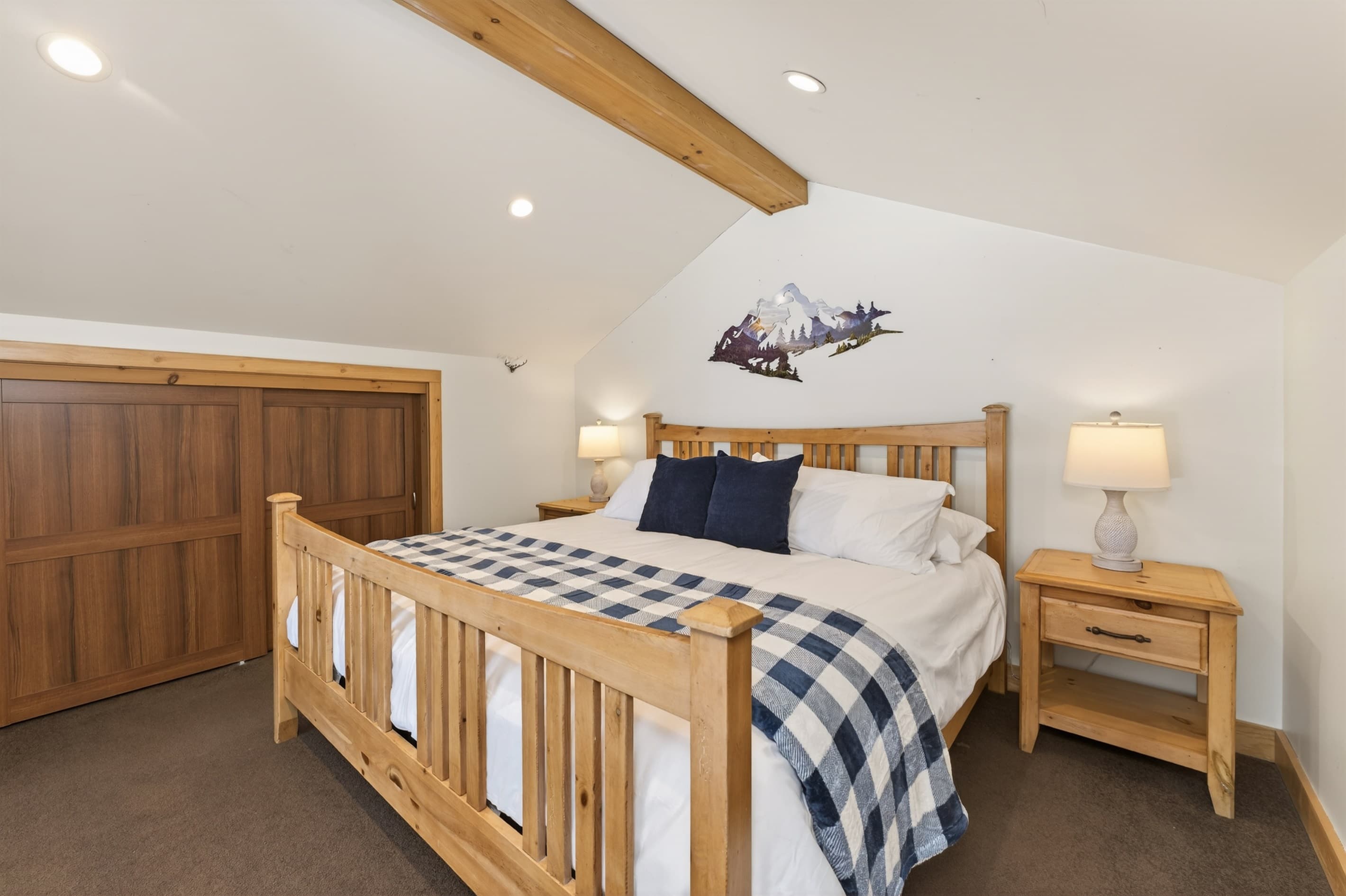 Loft bedroom with wooden railing