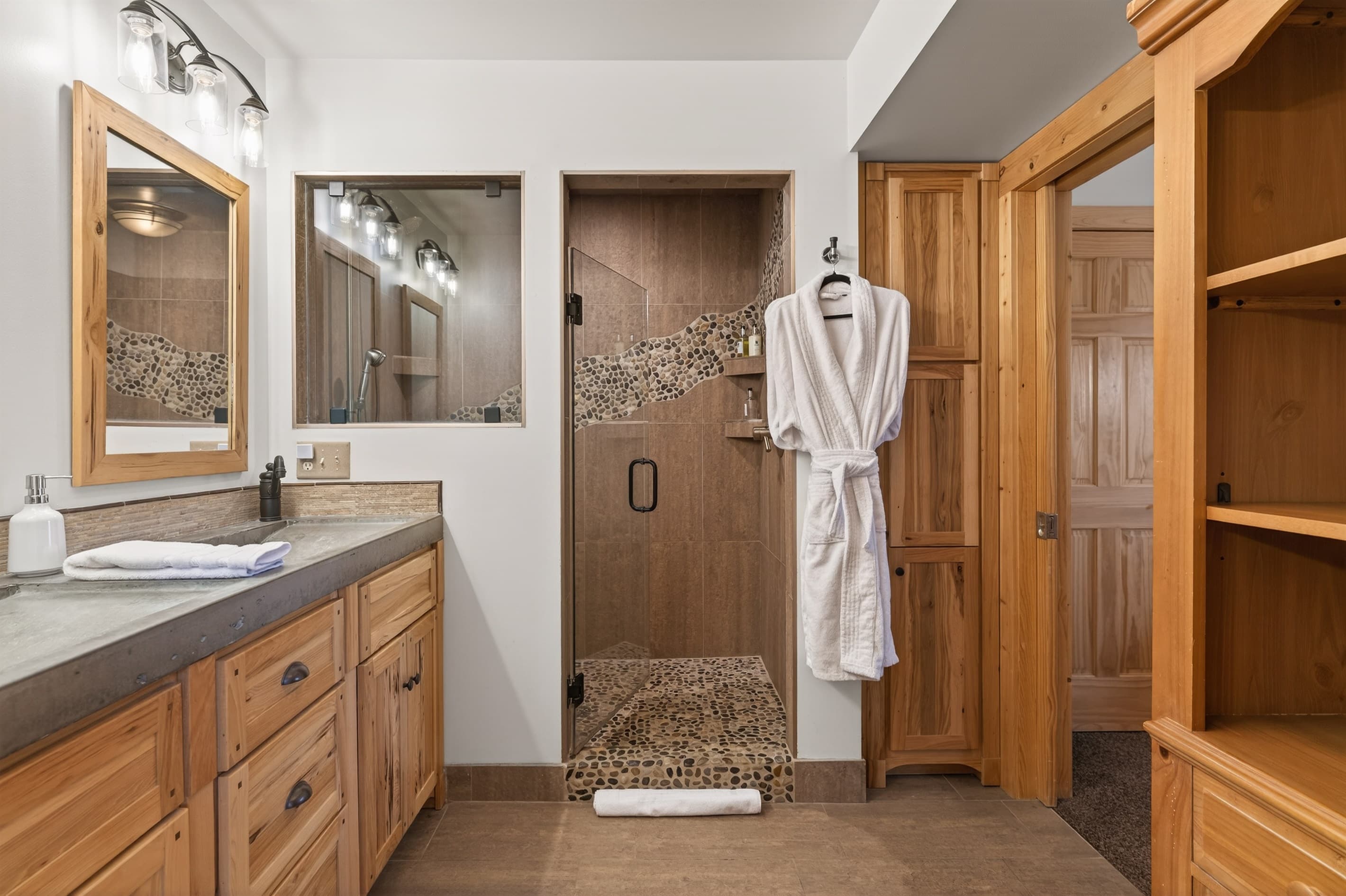 Bathroom with vanity and glass shower