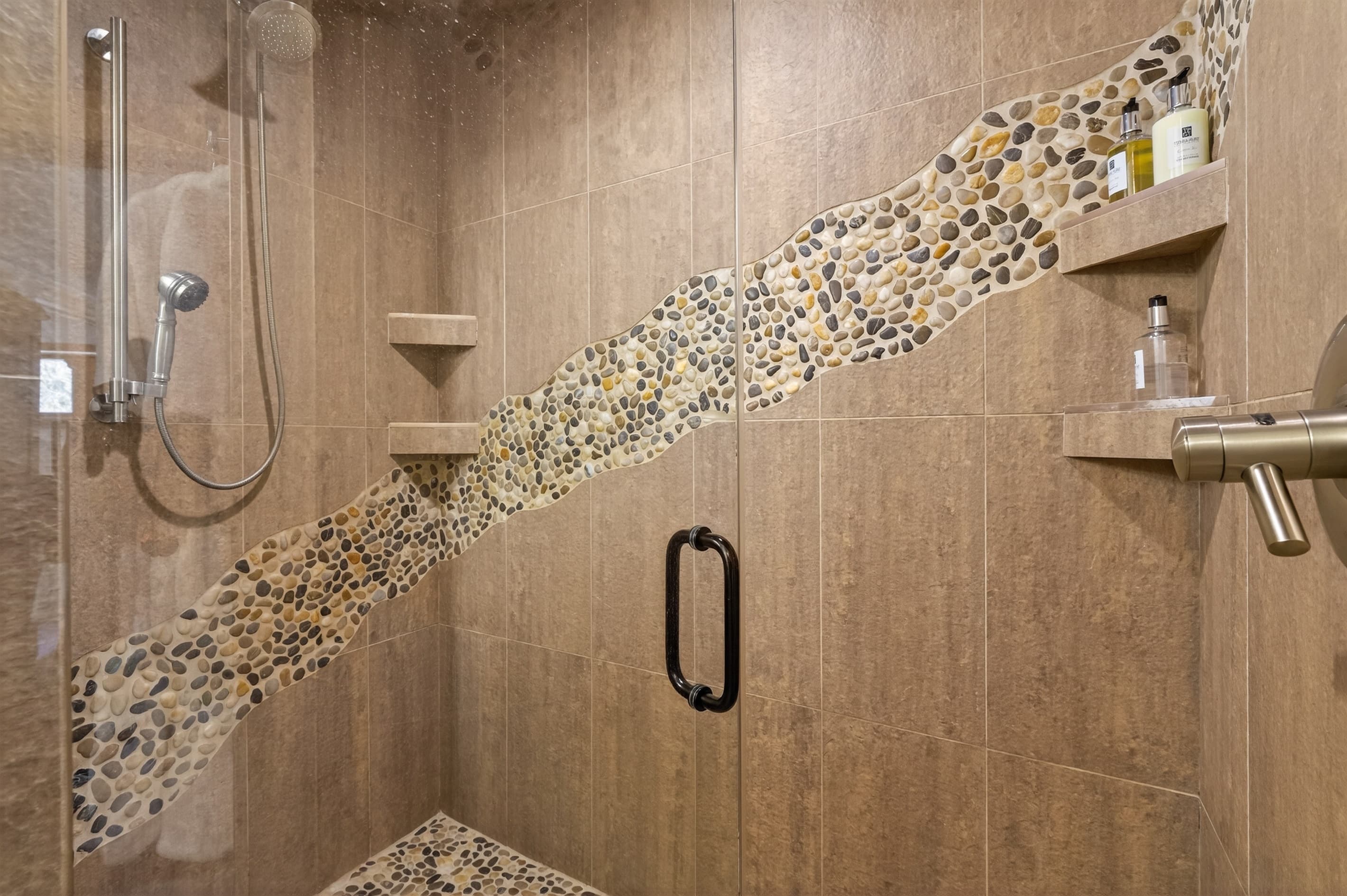 Tiled walk-in shower with built-in shelf