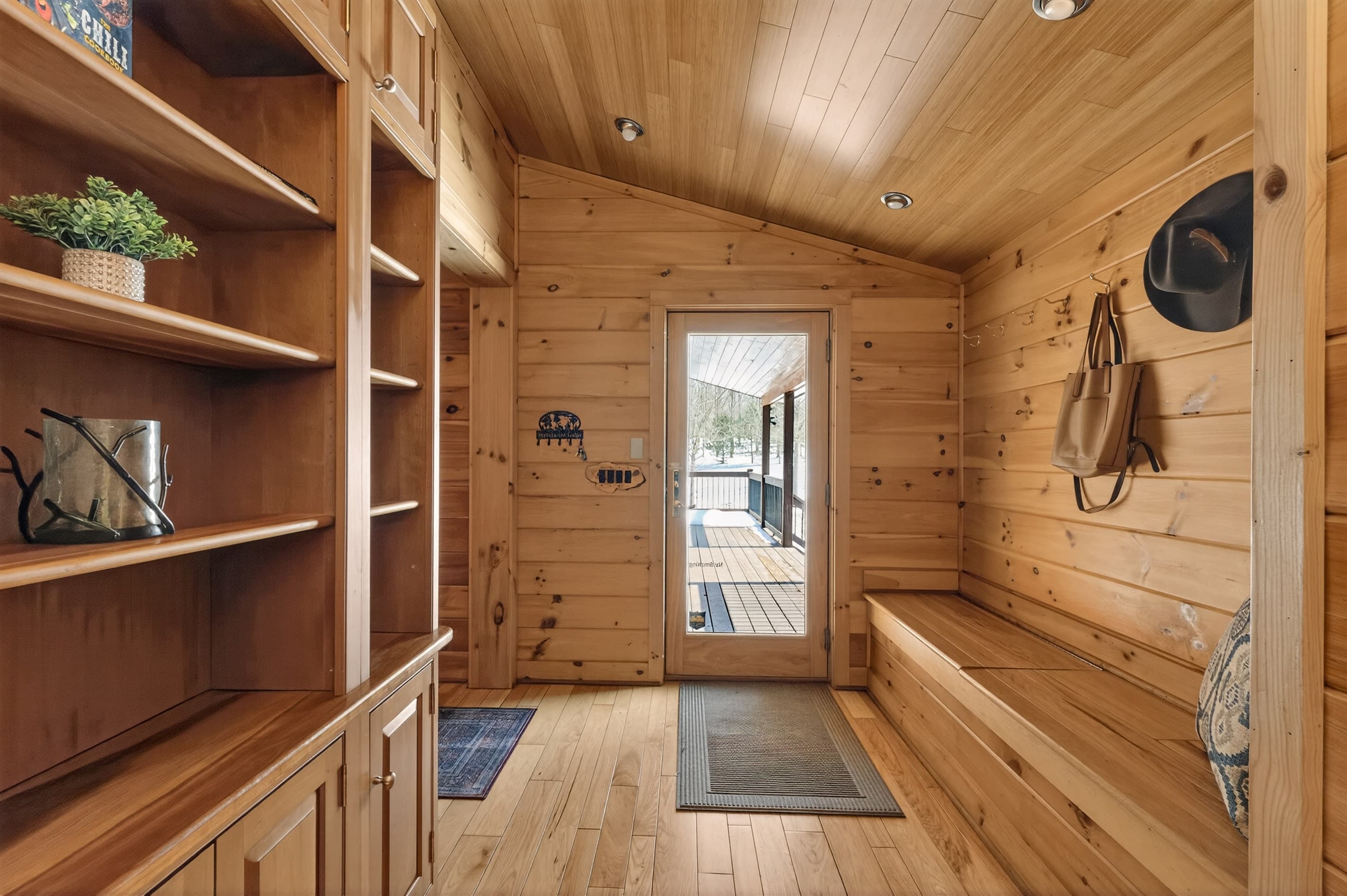 Walk-in closet with wooden shelving