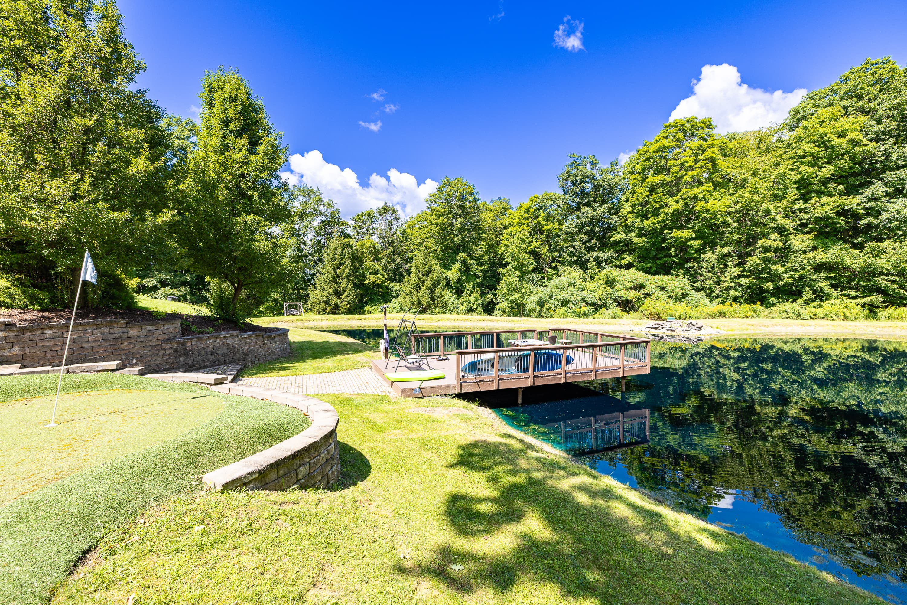 Open lawn beside the pond