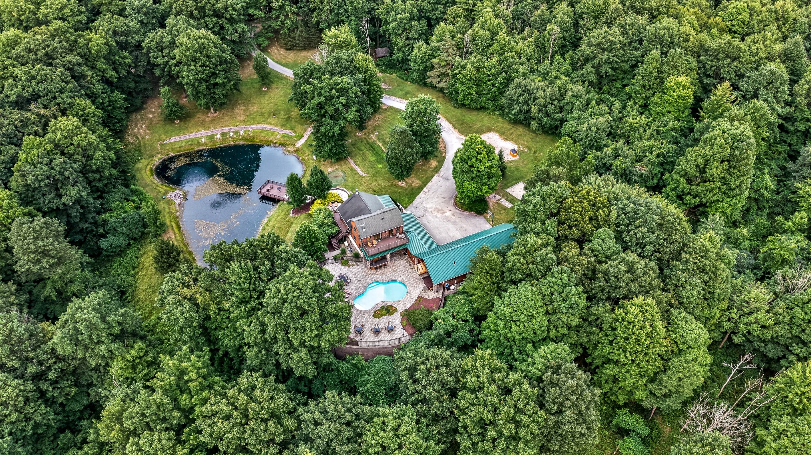 Aerial view of the wooded property