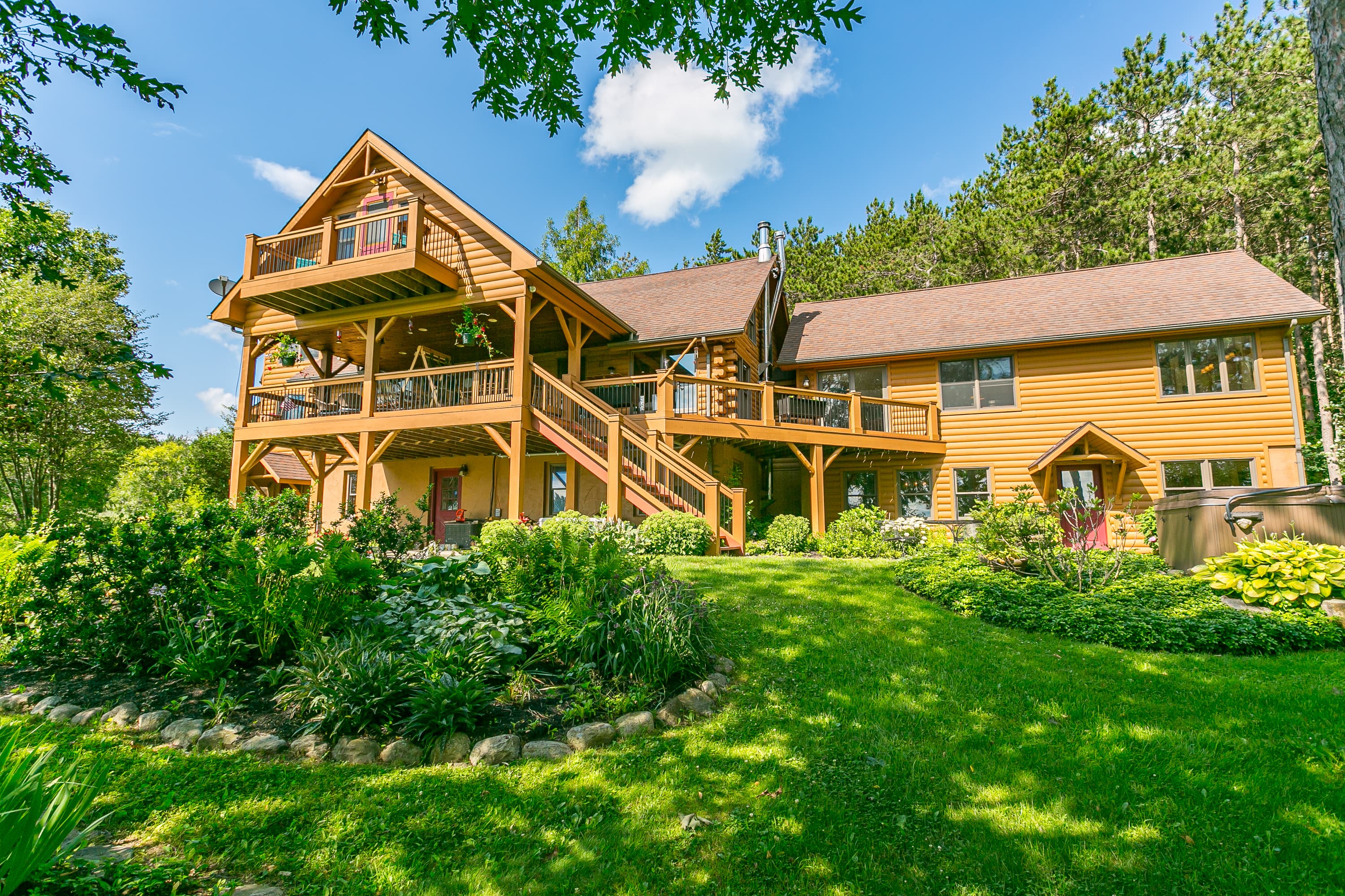 Wide view of the home’s rear exterior