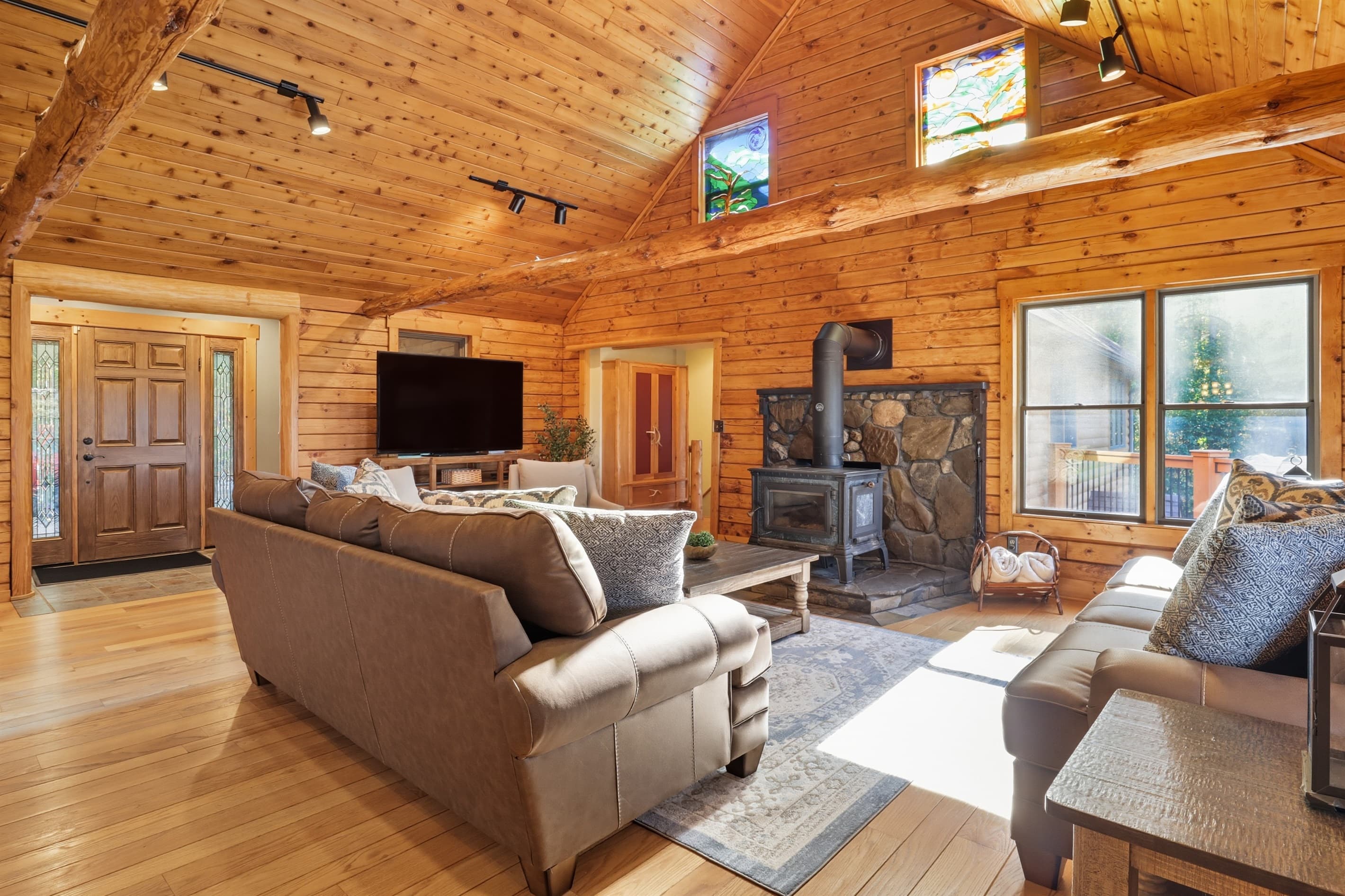 Living space with television and wood stove