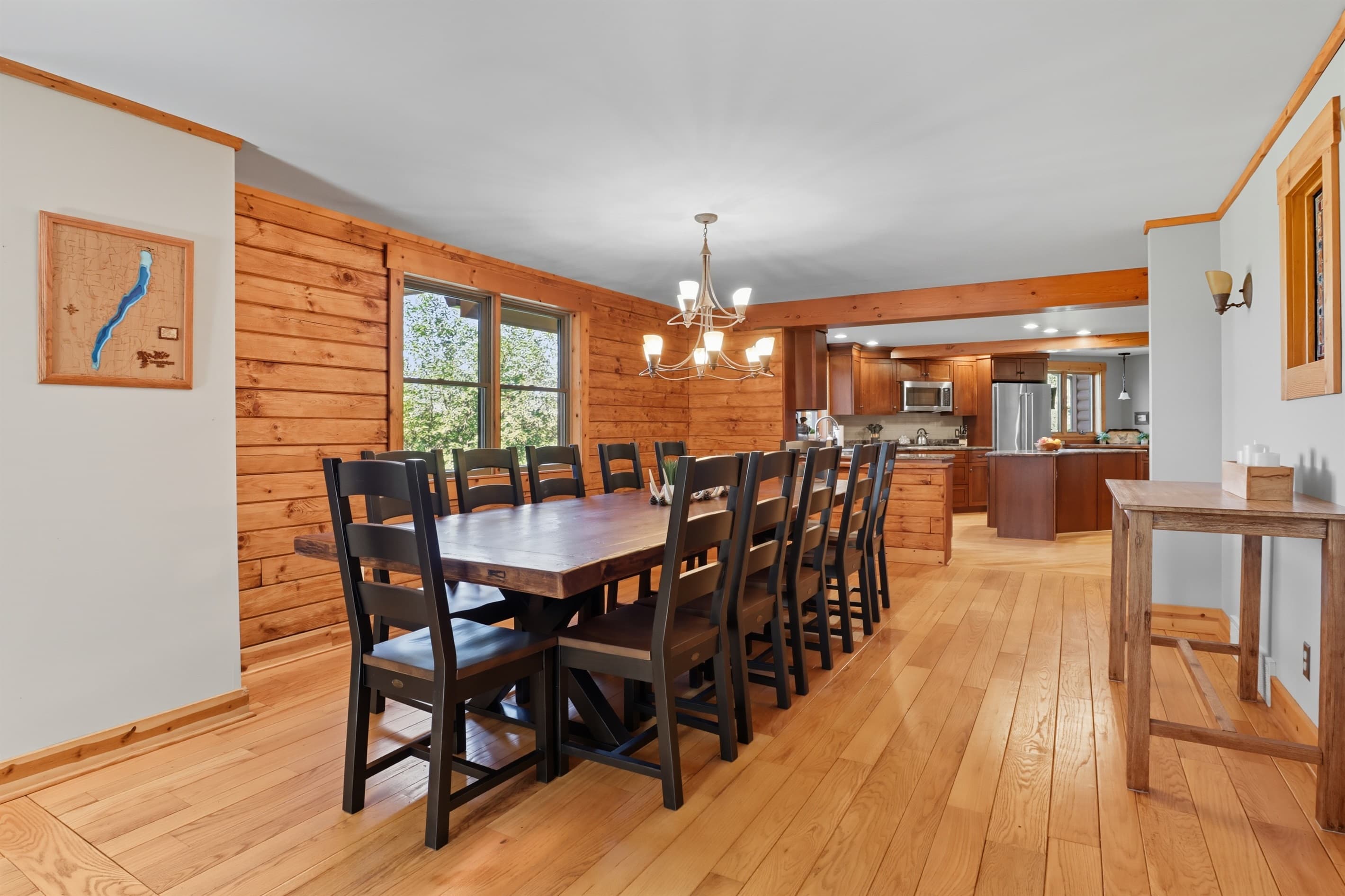 Kitchen and dining area with wood cabinetry