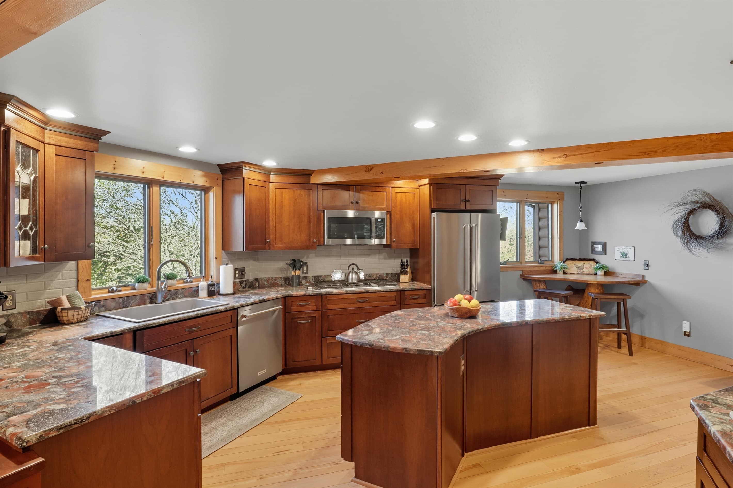 Wood cabinetry surrounding the cooking area