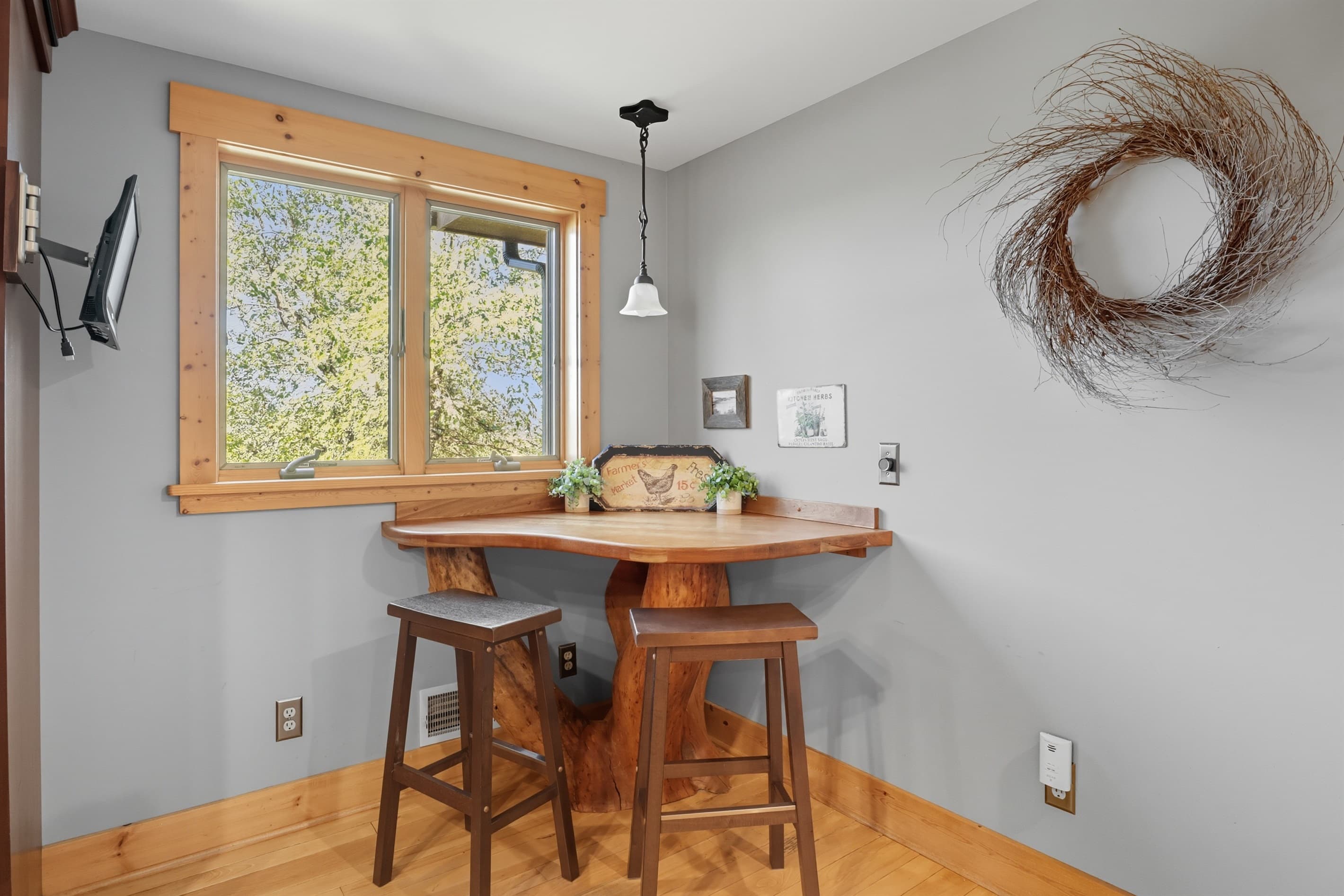 Breakfast nook beside two windows