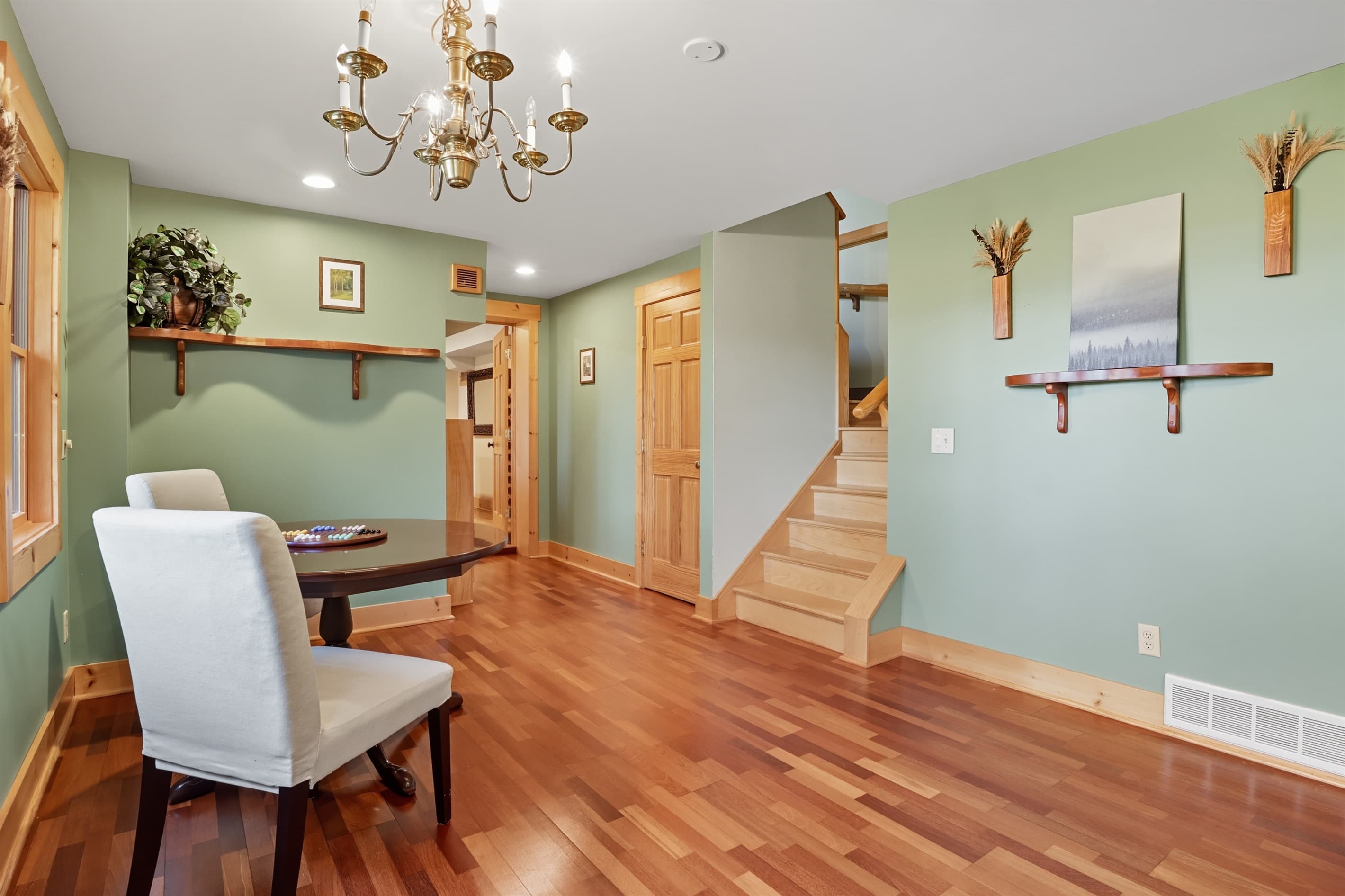 Foyer with wood staircase and open landing
