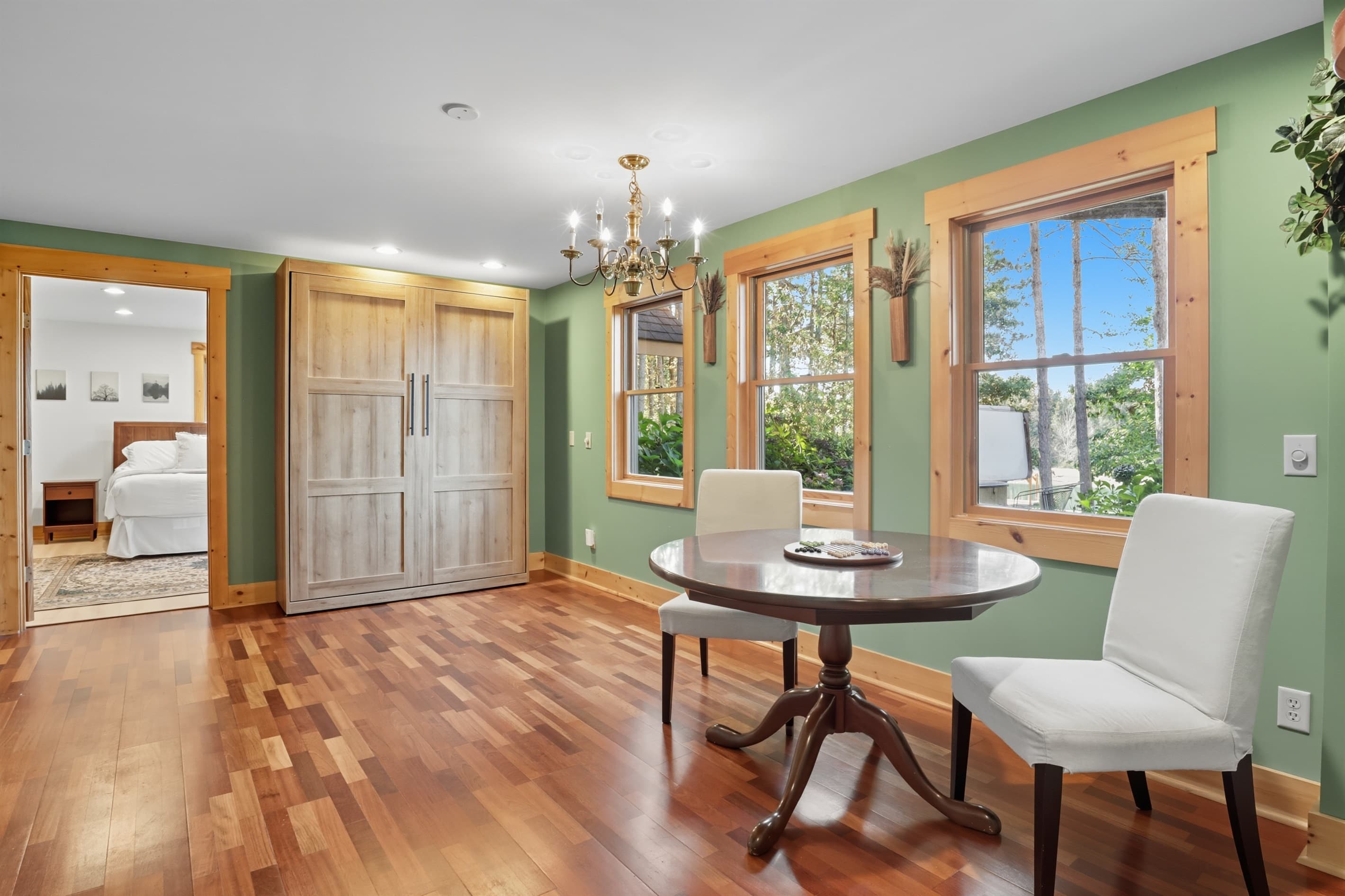 Corner seating area beside large windows