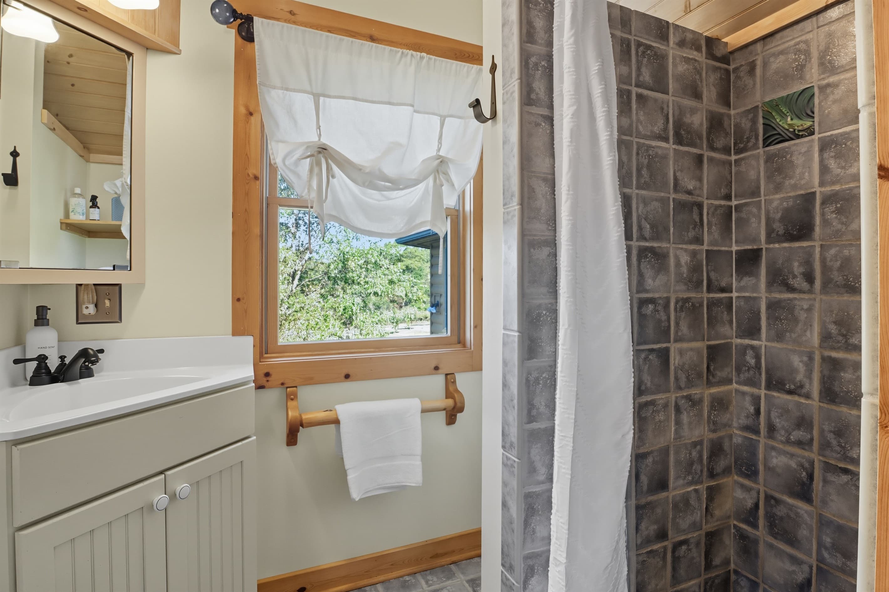 Full bathroom with walk-in shower