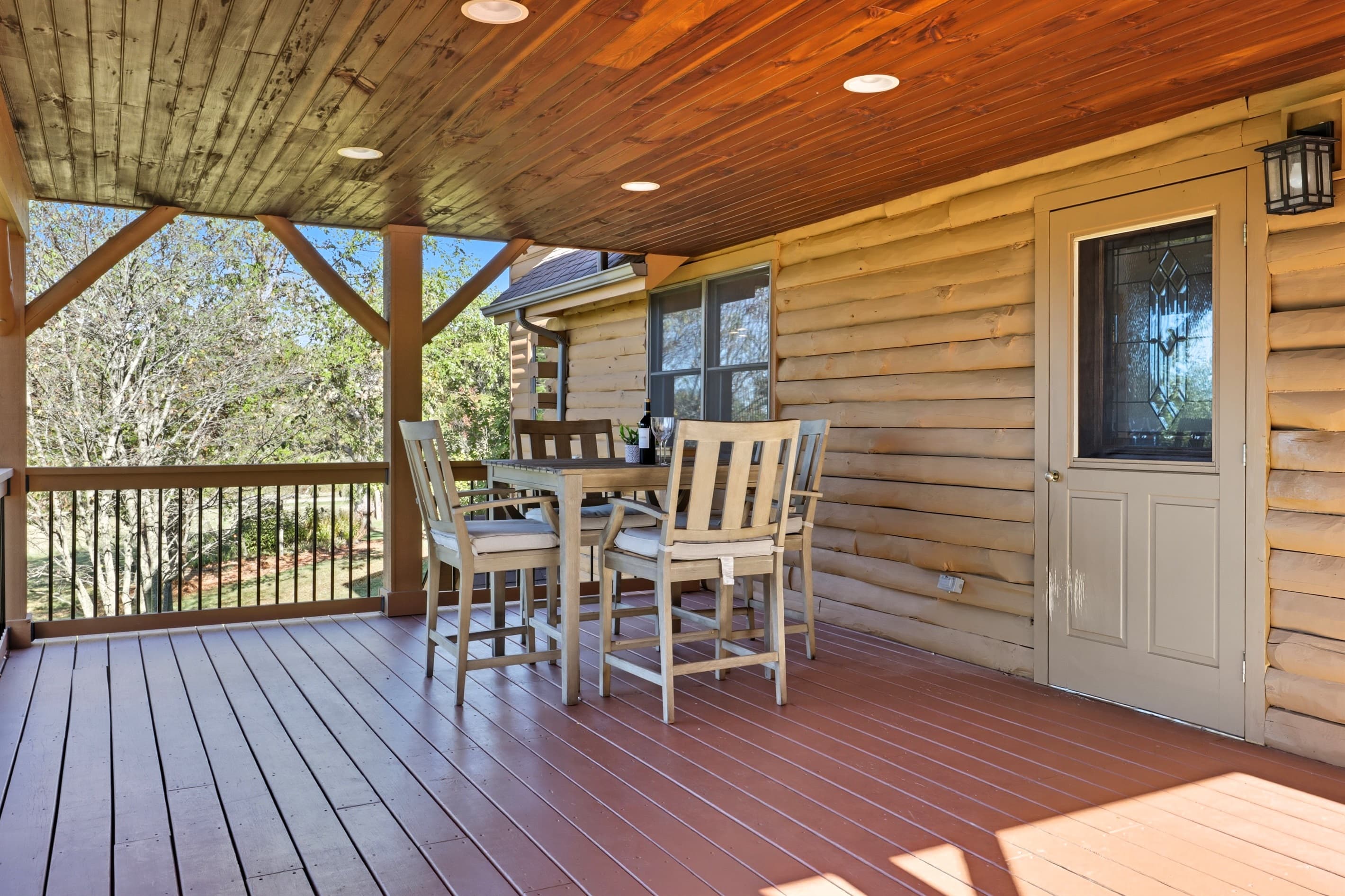 Covered deck with outdoor dining table
