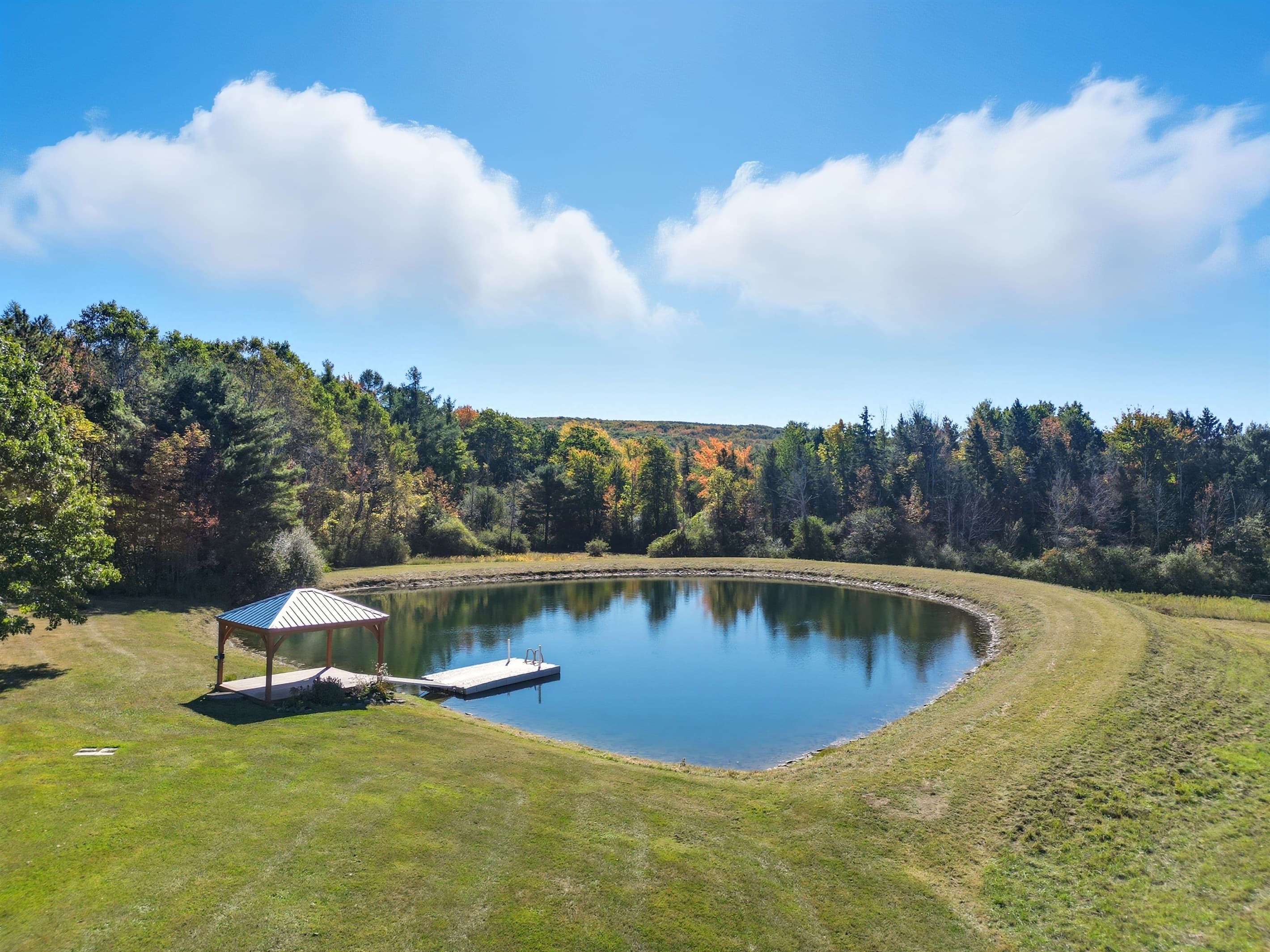 Private pond with a gazebo connected to the dock
