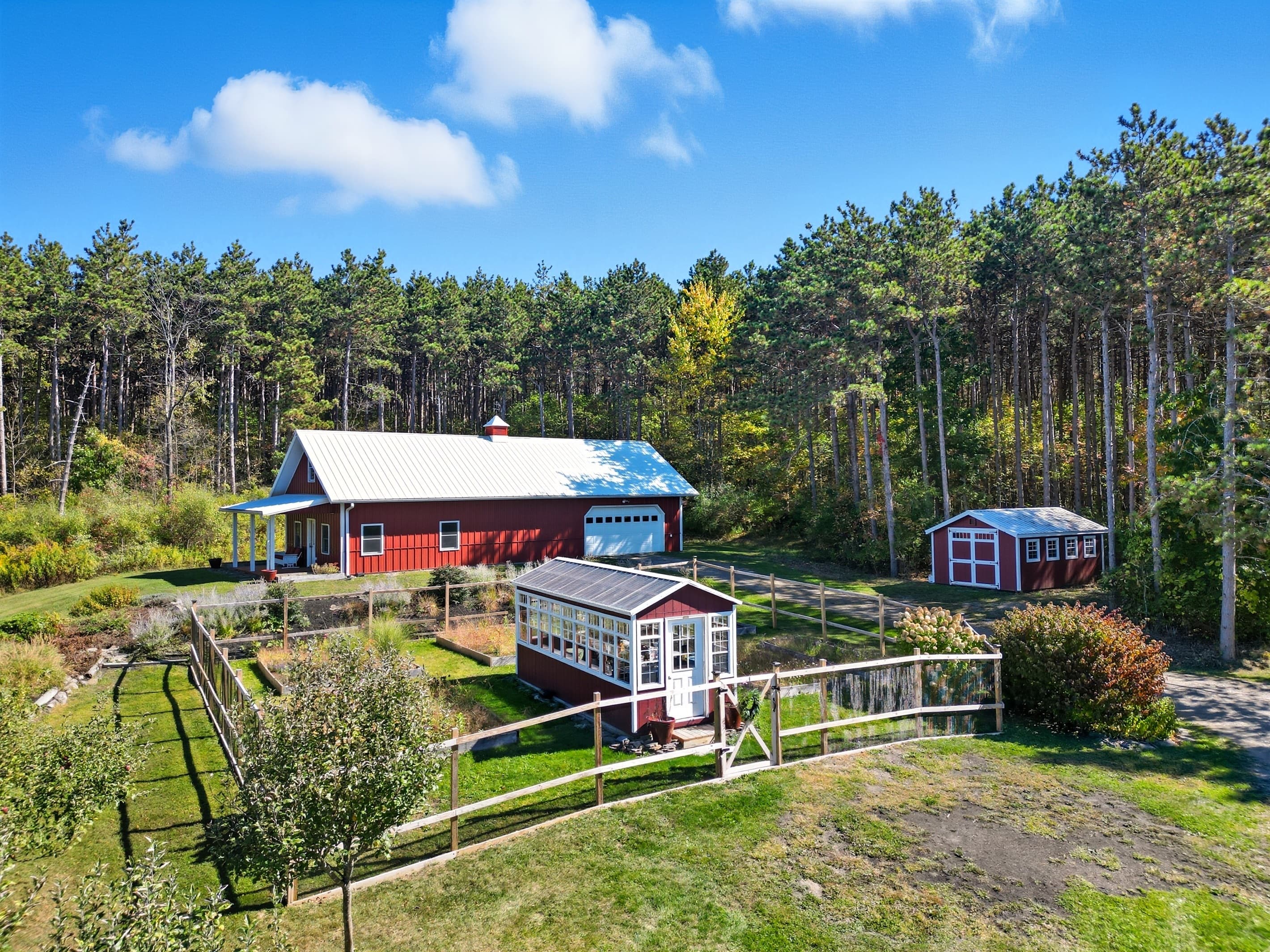 Red barn and nearby outbuildings