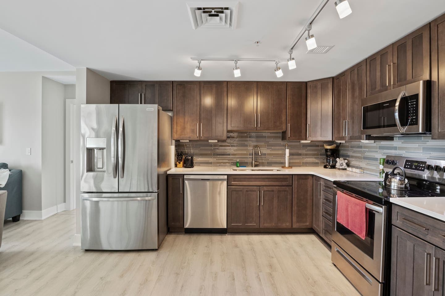 Kitchen with dark wood cabinetry